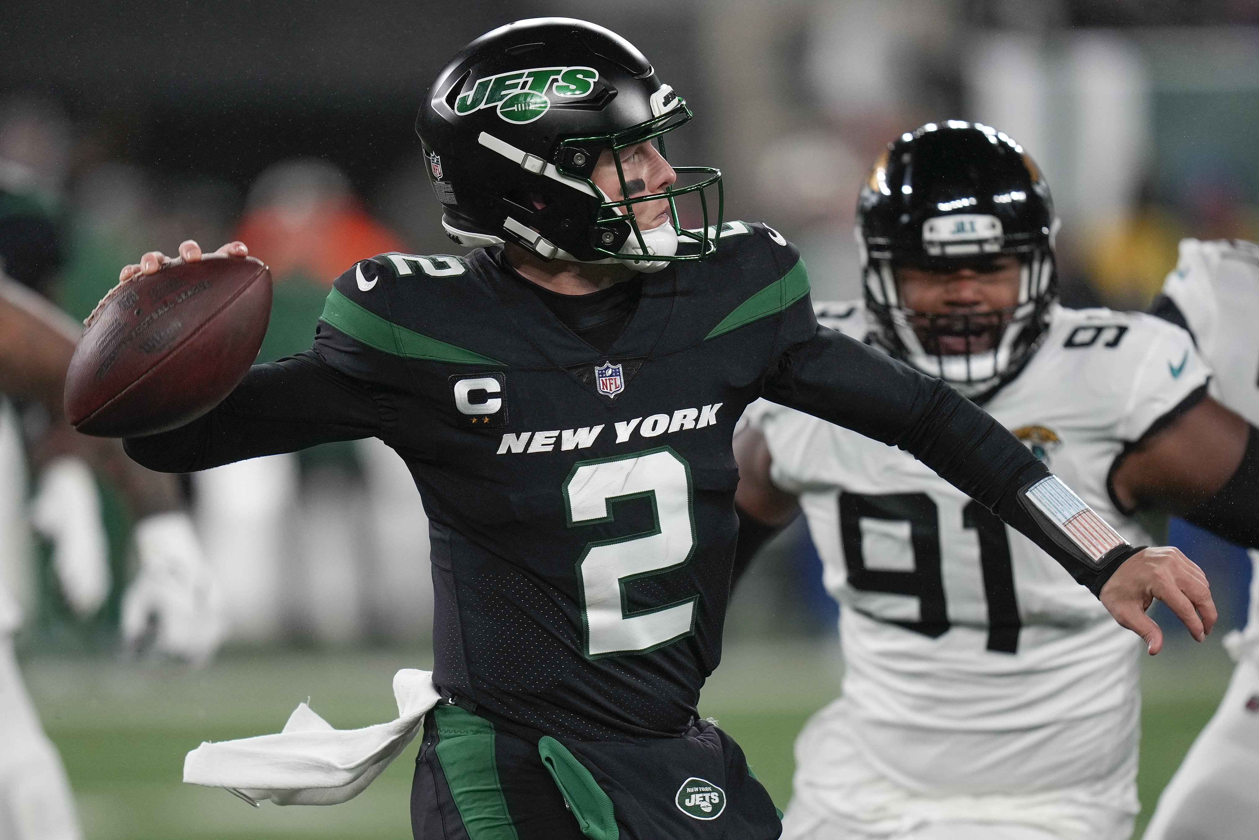 New York Jets quarterback Zach Wilson (2) passes against the Jacksonville Jaguars during the first quarter of an NFL football game, Thursday, Dec. 22, 2022, in East Rutherford, N.J. 
