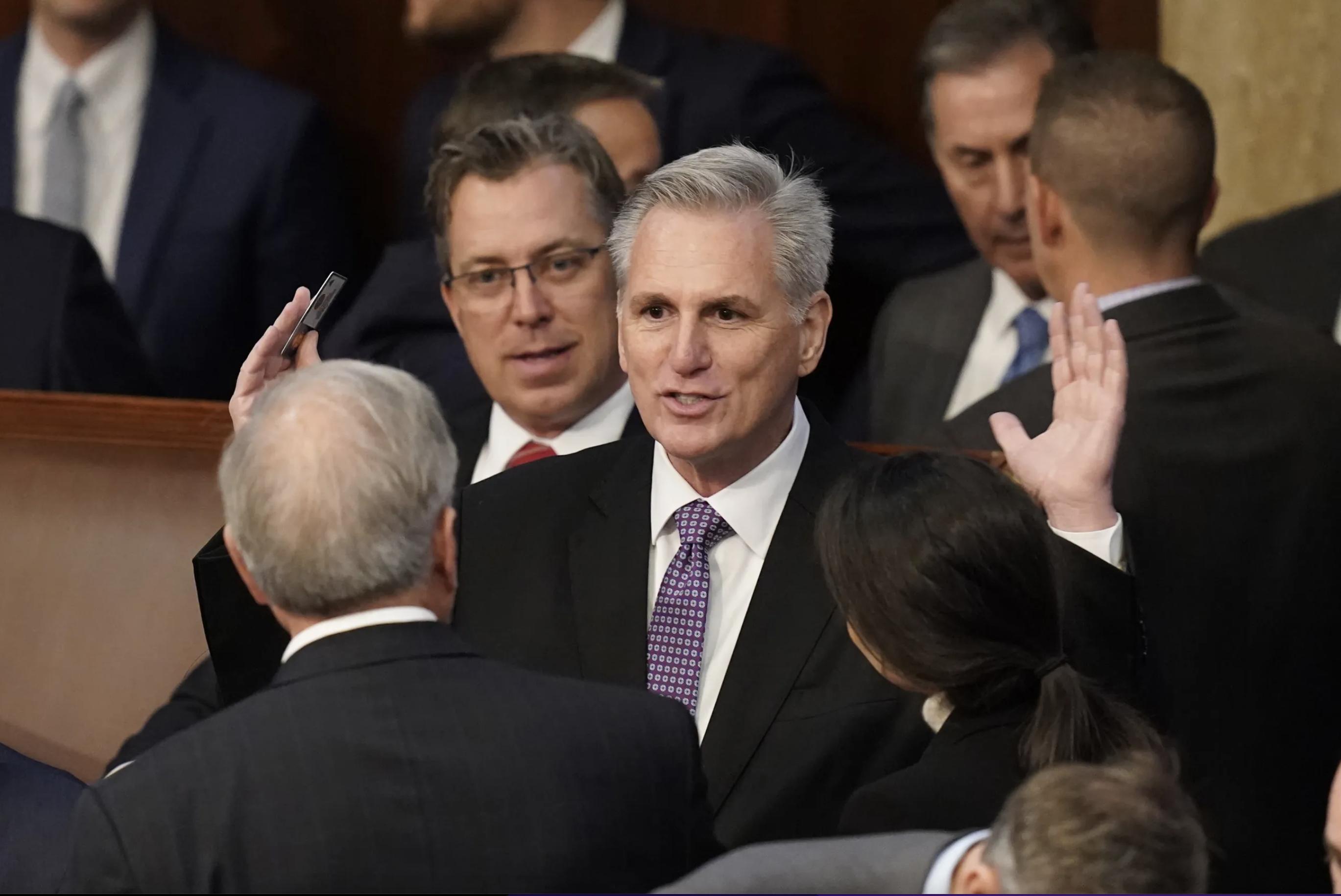 Rep. Kevin McCarthy, R-Calif., arrives in the House chamber as the House met for a second day to attempt to elect a speaker and convene the 118th Congress in Washington, Wednesday.