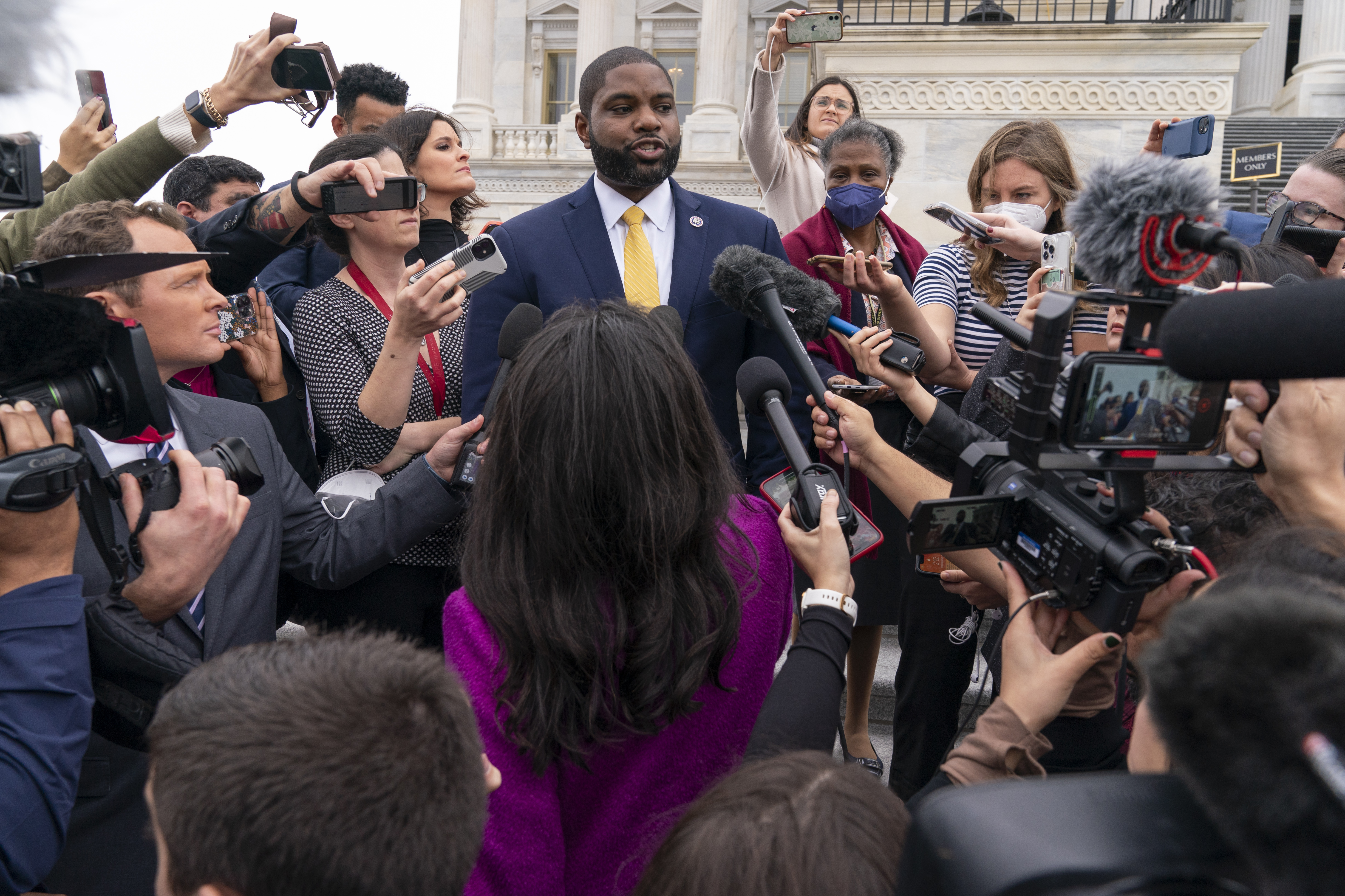 Rep. Byron Donalds, R-Fla., who has been nominated for Speaker of the House, speaks to members of the media on the House steps, Wednesday, on Capitol Hill in Washington.