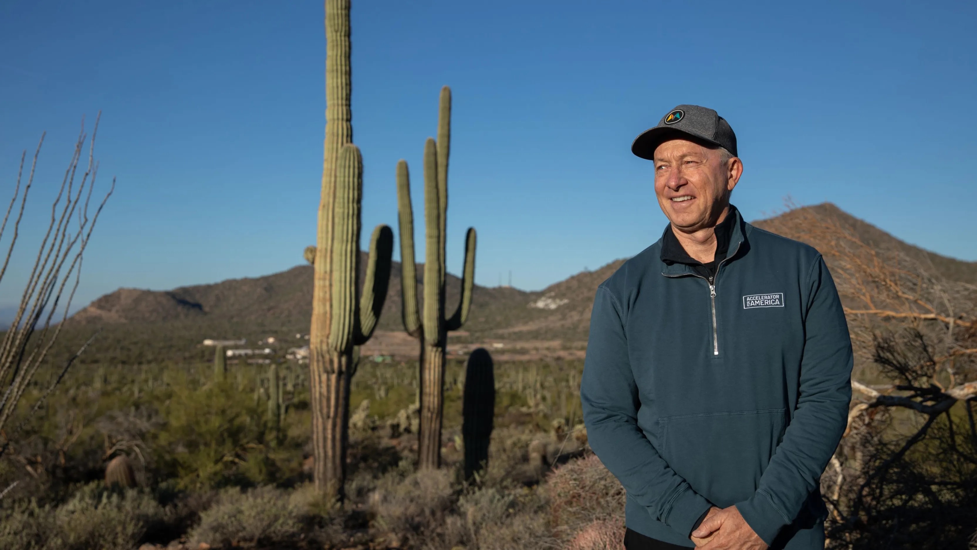 Mesa Mayor John Giles stands for a portrait among saguaro and cholla cacti while on a morning hike at Usery Mountain Regional Park in Mesa, Ariz., on Thursday, Dec. 8, 2022.