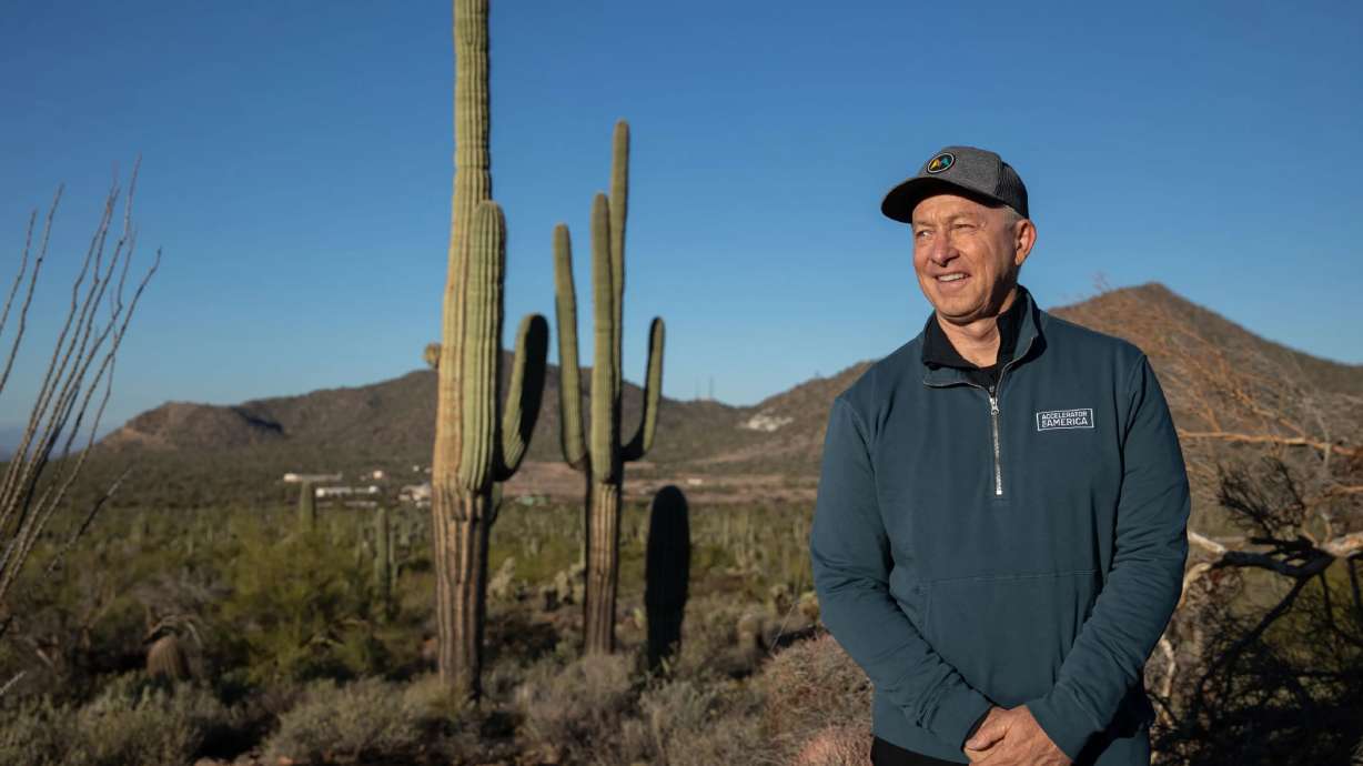 Mesa Mayor John Giles stands for a portrait among saguaro and cholla cacti while on a morning hike at Usery Mountain Regional Park in Mesa, Ariz., on Thursday, Dec. 8, 2022.
