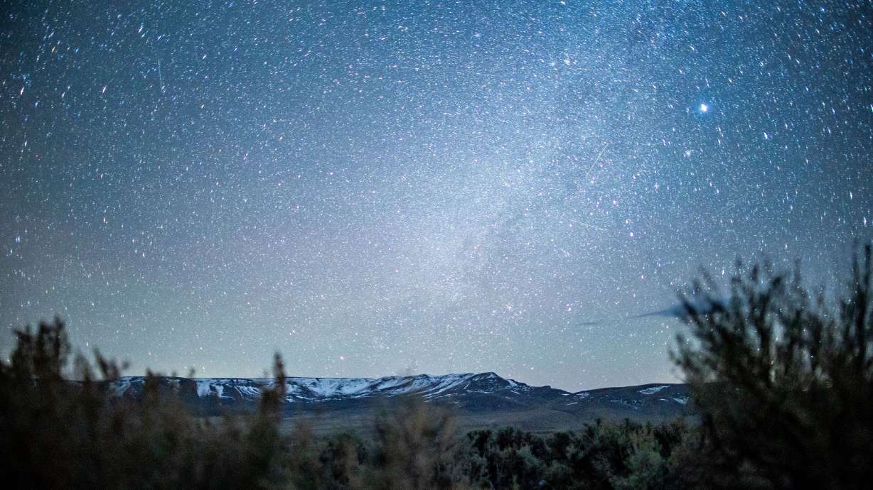 Starlight illuminates the sagebrush and mountains near the site of a proposed lithium mine at Thacker Pass, Nevada, on April 1, 2021. A western mining project for green energy resources is at the center of a court struggle where multiple parties are involved.