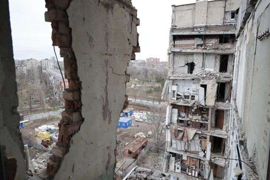 A view of an apartment building, damaged during a heavy fighting, in Mariupol, in Russian-controlled Donetsk region, eastern Ukraine, Thursday.