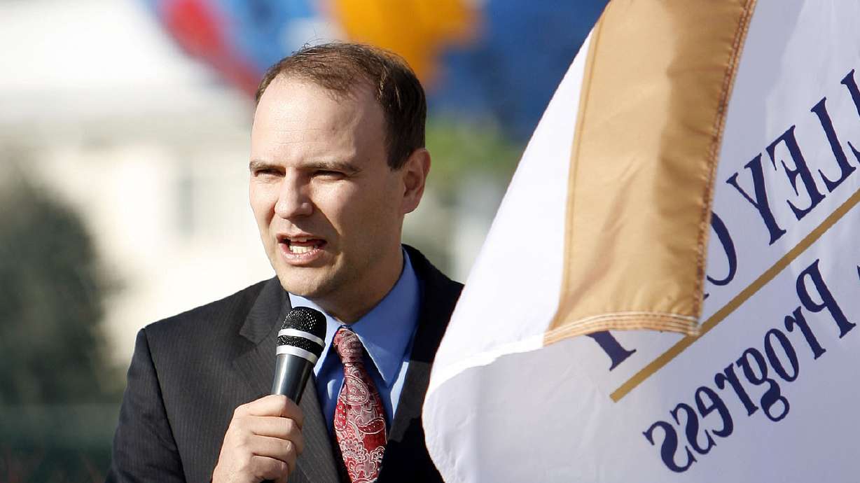 Corey Rushton speaks during a ceremony announcing the unveiling of Rosa Parks Drive in West Valley City on Nov. 15, 2012. He is one of eight candidates hoping to fill the state Senate seat vacated by Sen. Karen Mayne.