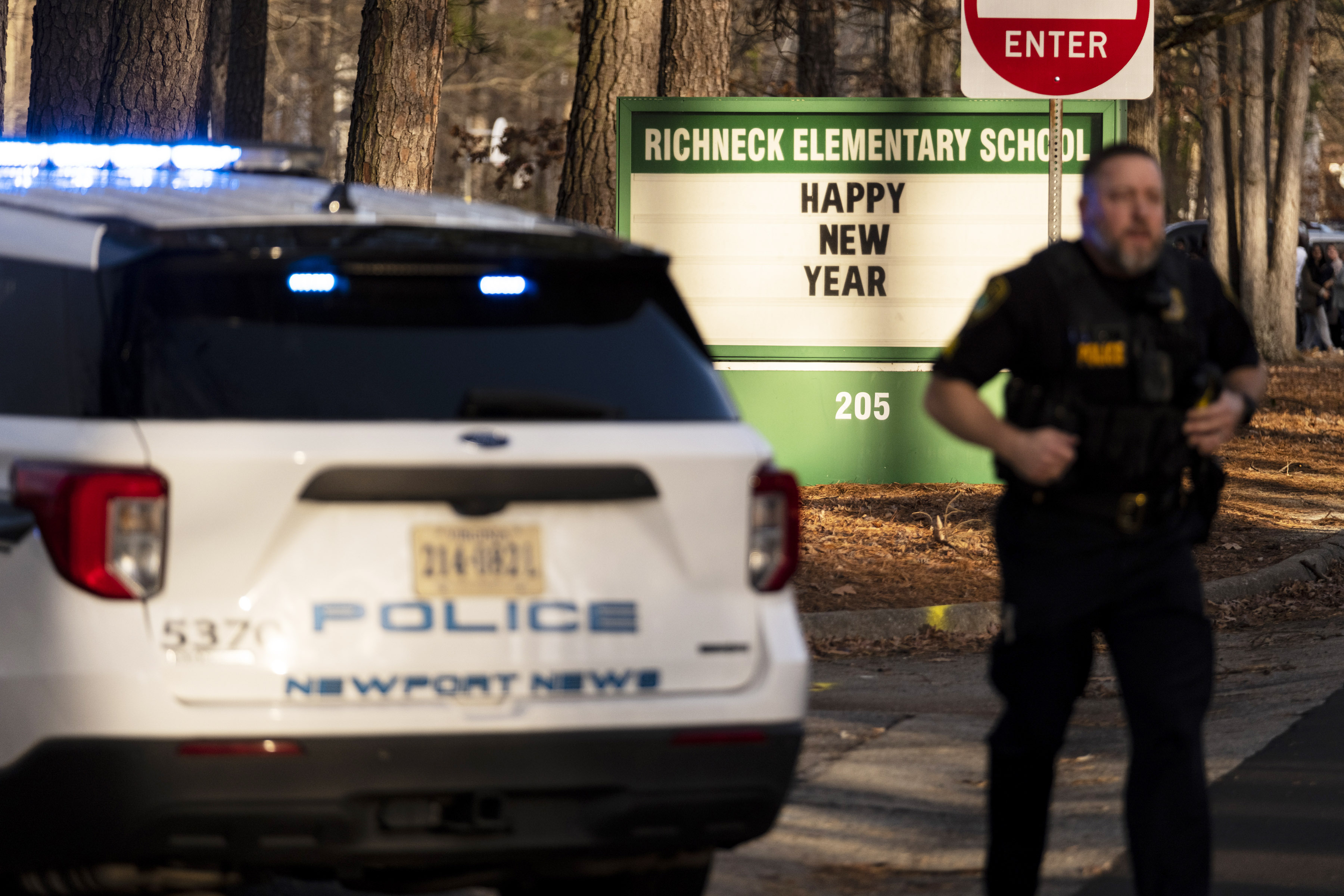 Police respond to a shooting at Richneck Elementary School, Friday in Newport News, Va. A shooting at a Virginia elementary school sent a teacher to the hospital.