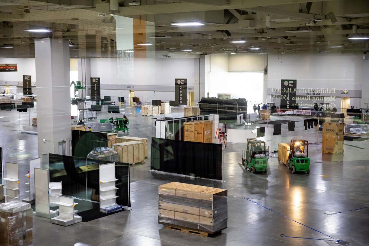 Crews work to set up the exhibition hall in preparation for the Outdoor Retailer show at the Salt Palace Convention Center in Salt Lake City on Thursday.