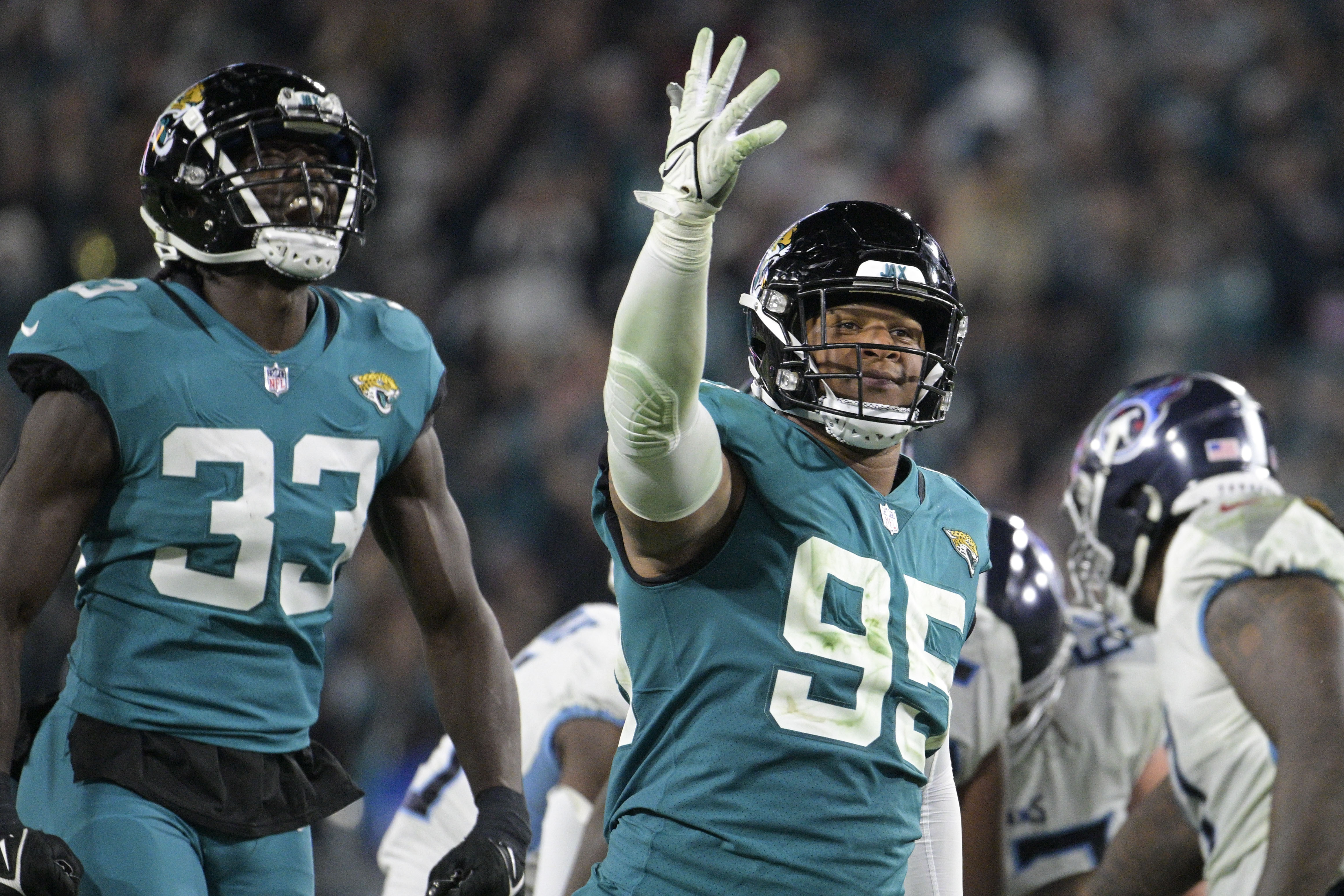 Jags return fumble for TD, beat Titans for AFC South title