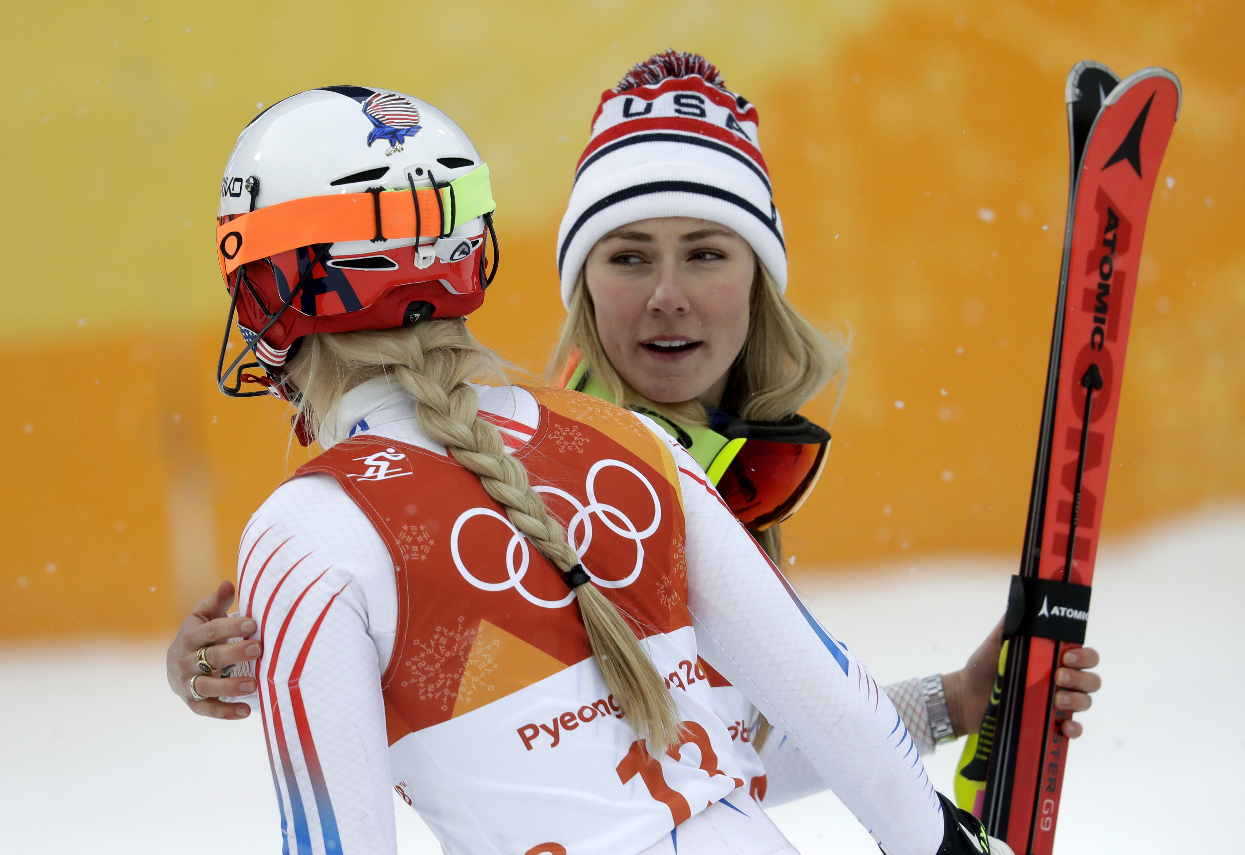 FILE - Mikaela Shiffrin, of the United States, right, hugs compatriot Lindsey Vonn after the women's combined slalom at the 2018 Winter Olympics in Jeongseon, South Korea, Thursday, Feb. 22, 2018. Mikaela Shiffrin has matched Lindsey Vonn’s women’s World Cup skiing record with her 82nd win at the women's World Cup giant slalom race, in Kranjska Gora, Slovenia, on Sunday, Jan. 8, 2023. 