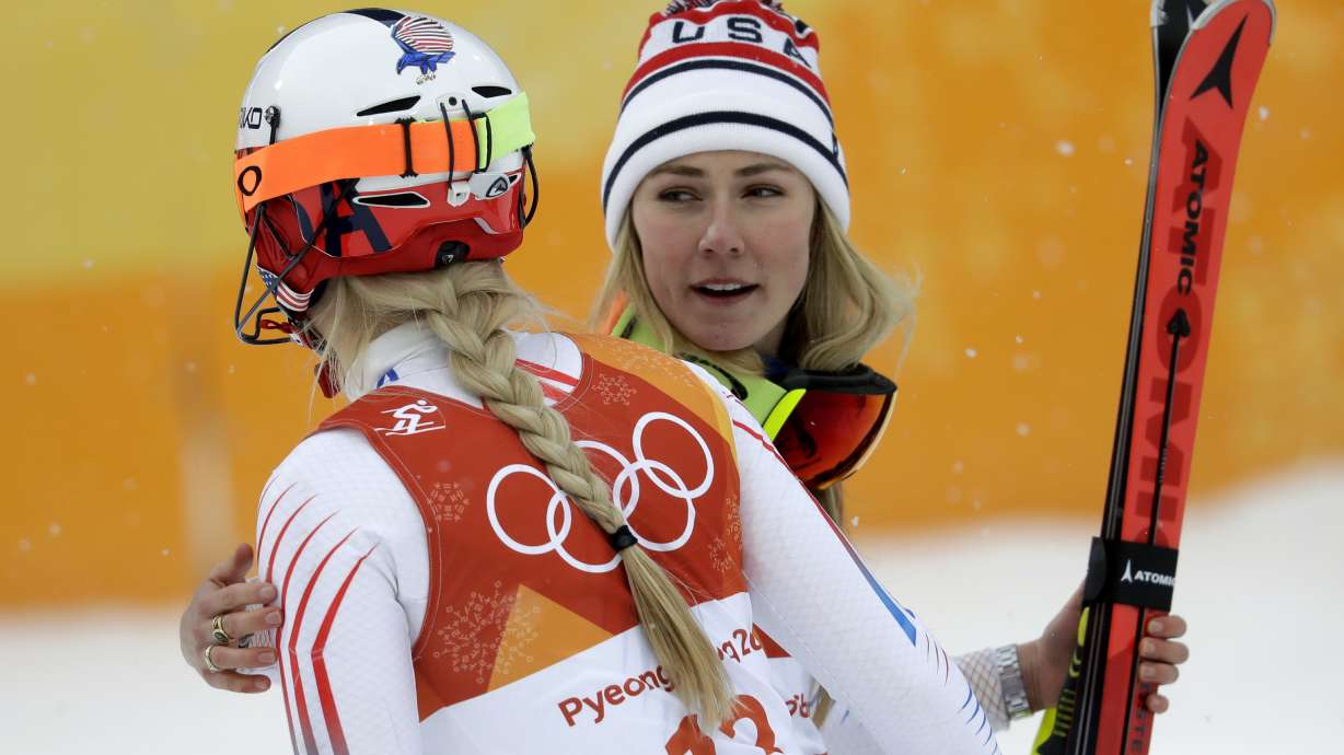 FILE - Mikaela Shiffrin, of the United States, right, hugs compatriot Lindsey Vonn after the women's combined slalom at the 2018 Winter Olympics in Jeongseon, South Korea, Thursday, Feb. 22, 2018. Mikaela Shiffrin has matched Lindsey Vonn’s women’s World Cup skiing record with her 82nd win at the women's World Cup giant slalom race, in Kranjska Gora, Slovenia, on Sunday, Jan. 8, 2023.