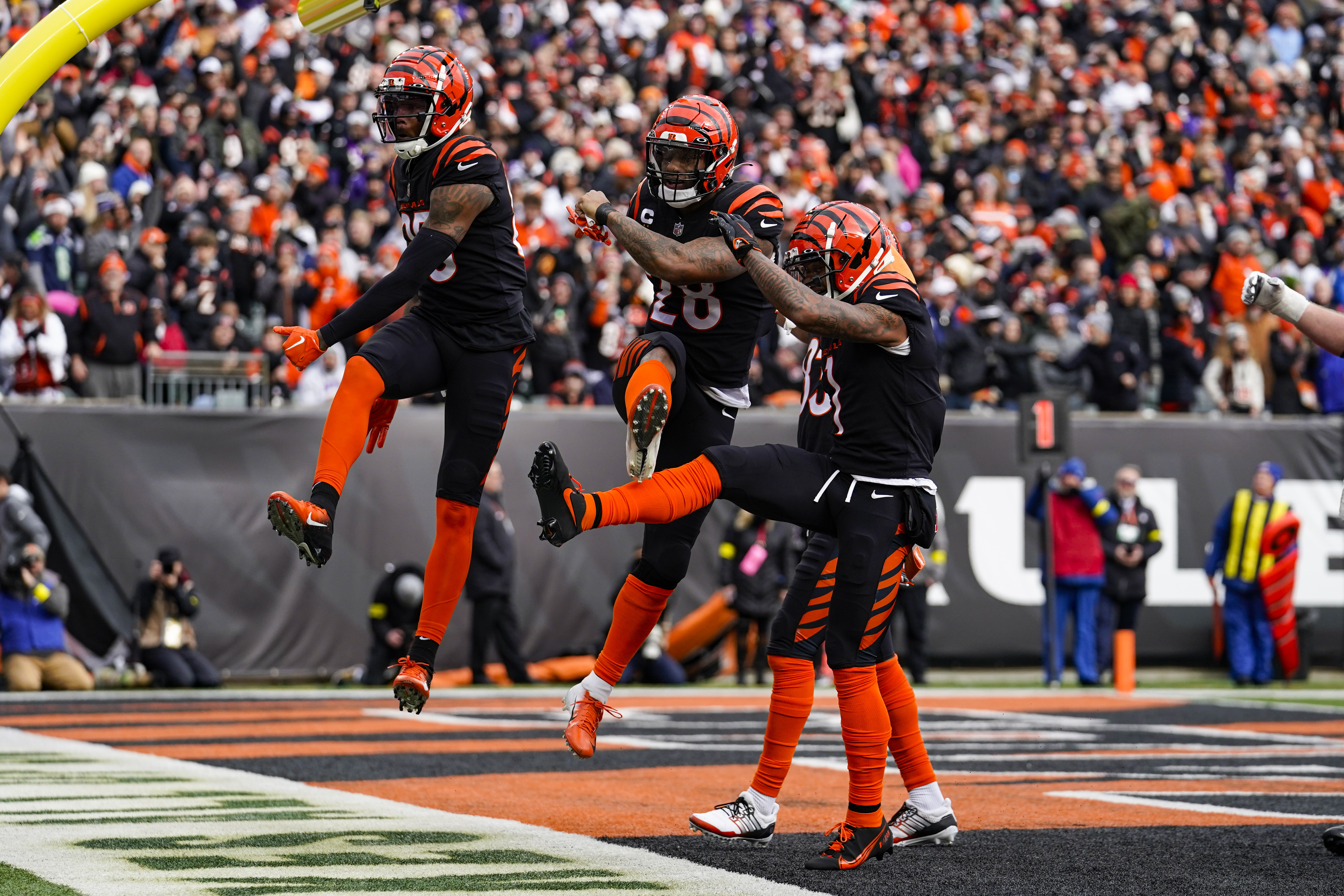 Cincinnati Bengals running back Joe Mixon, center, celebrates a touchdown against the Baltimore Ravens in the first half of an NFL football game in Cincinnati, Sunday, Jan. 8, 2023. 