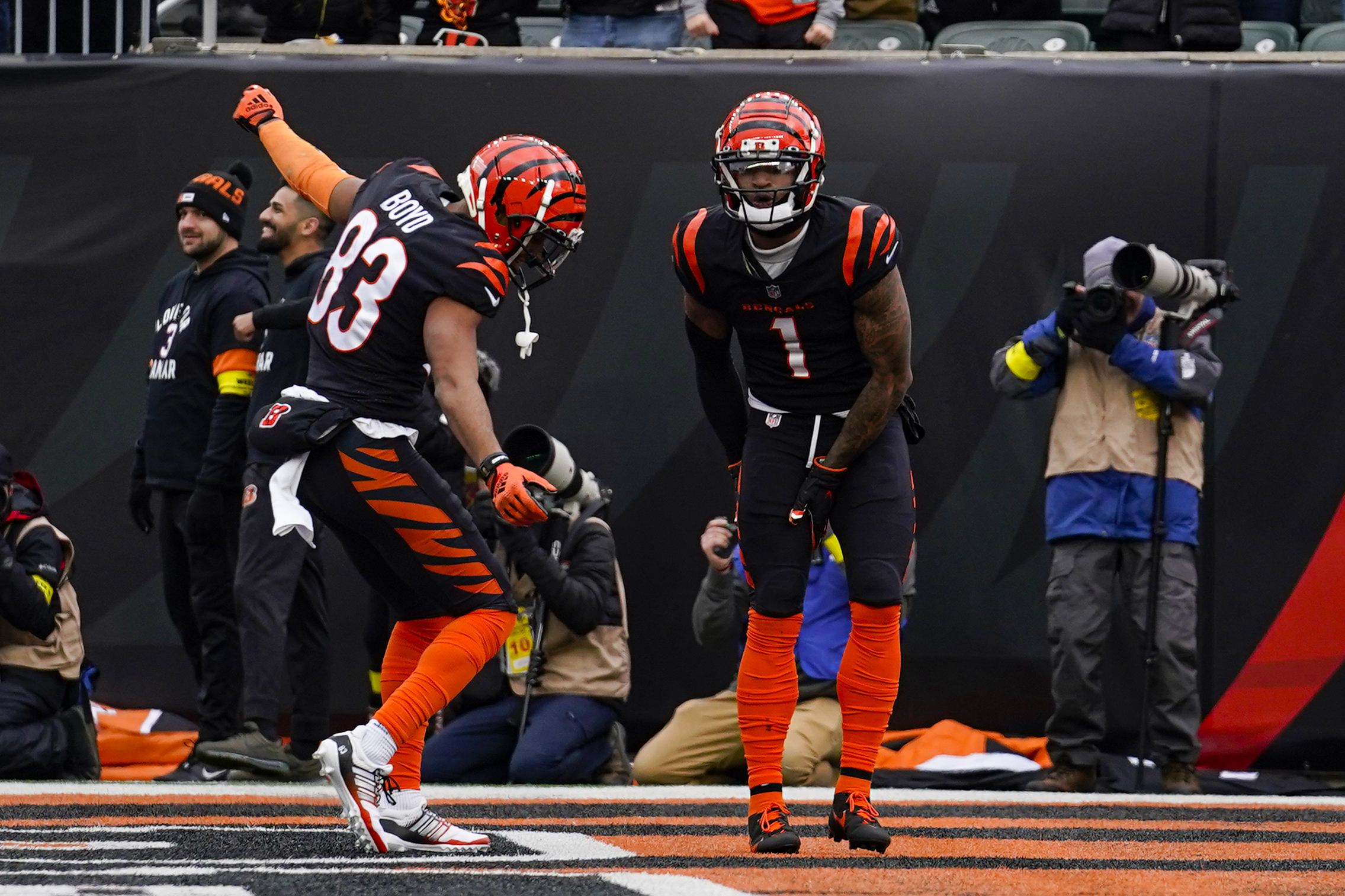 Cincinnati Bengals wide receiver Ja'Marr Chase (1) celebrates with Tyler Boyd (83) after a touchdown against the Baltimore Ravens in the first half of an NFL football game in Cincinnati, Sunday, Jan. 8, 2023. 