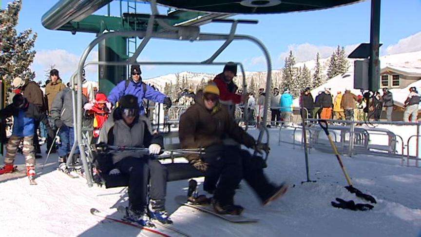 Skiers and Snowboarders Excited About Snow in the Mountains