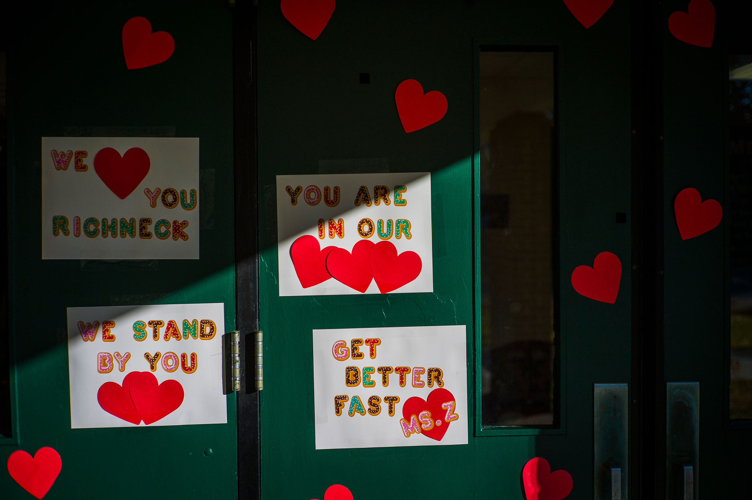 Messages of support for teacher Abby Zwerner, who was shot by a 6 year old student, grace the front door of Richneck Elementary School Newport News, Va. on Monday.