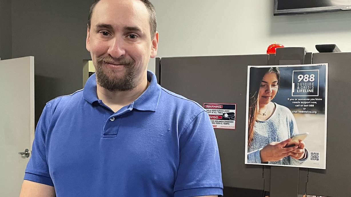 988 Call Center Director Jamieson Brill at a facility in Hyattsville, Md., Oct. 7, 2022. Brill works in one of more than 200 call centers fanned out around the country tasked with answering an uptick in calls.