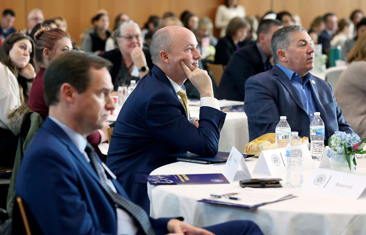 Gov. Spencer Cox listens to a panel discussion about public health concerns for Utah teens during a Social Media and Youth Mental Health Symposium at O.C. Tanner in Salt Lake City on Tuesday.