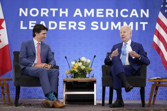 President Joe Biden speaks as he meets with Canadian Prime Minister Justin Trudeau at the InterContinental Presidente Mexico City hotel in Mexico City on Tuesday.