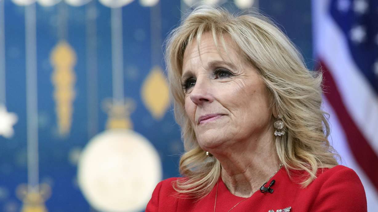 First lady Jill Biden speaks in the South Court Auditorium on the White House complex in Washington on Dec. 12. On Wednesday, the White House said surgeons removed a cancerous lesion above the first lady's right eye and one on her chest, and that a third lesion on her left eyelid is being examined.
