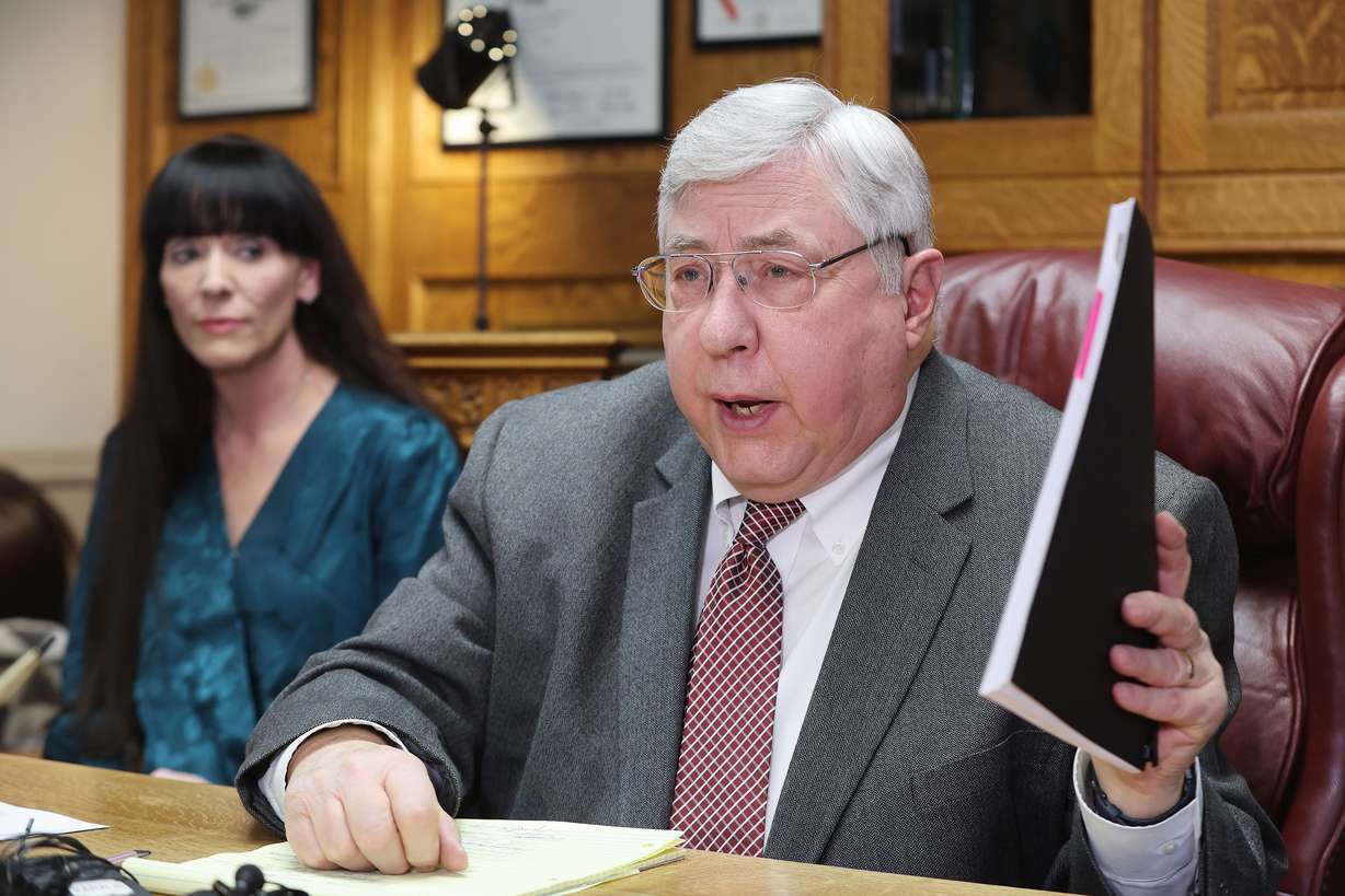 Attorney Robert B. Sykes and his client Chantelle Jones speak during a press conference in Salt Lake City on Tuesday about their complaint against the city of Saratoga Springs and a Saratoga Springs police officer over sexual harassment and sexual assault.