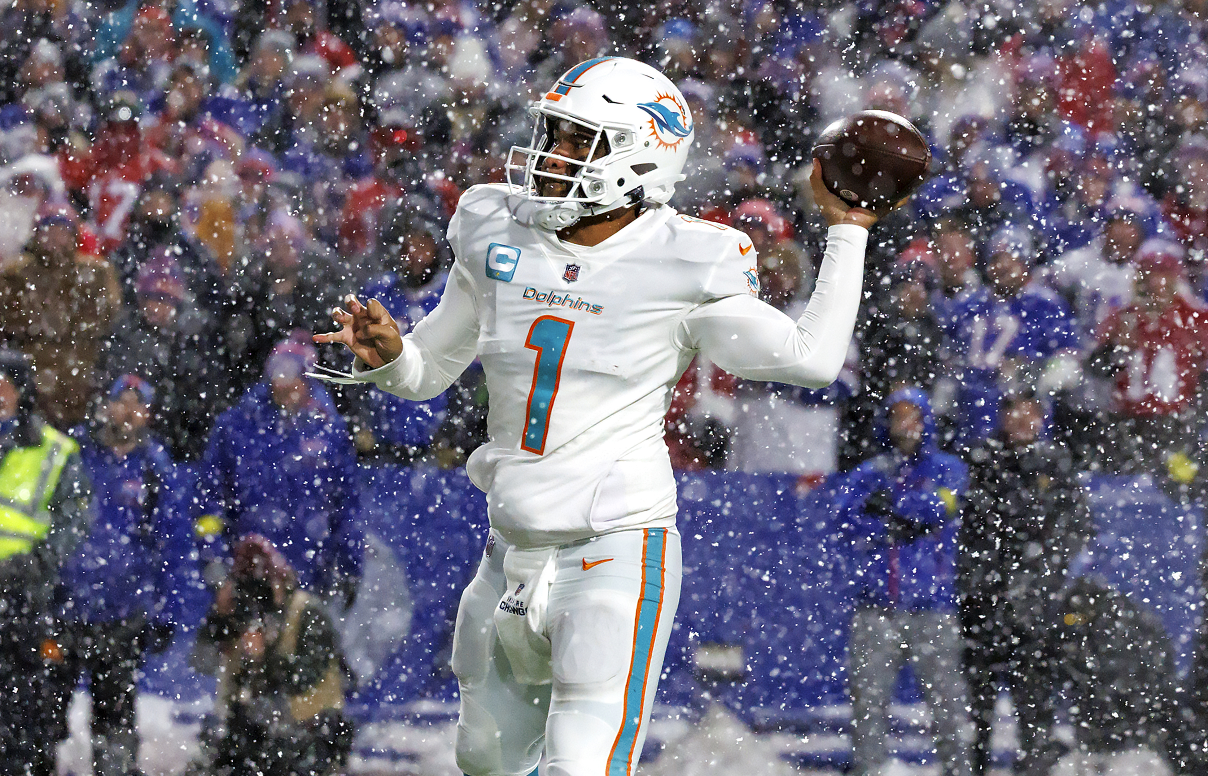 Miami Dolphins quarterback Tua Tagovailoa (1) sets up to pass during fourth quarter of an NFL football game against the Buffalo Bills at Highmark Stadium on Saturday, Dec. 17, 2022 in Orchard Park, N.Y. 