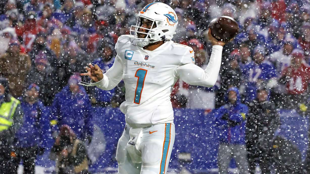Miami Dolphins quarterback Tua Tagovailoa (1) sets up to pass during fourth quarter of an NFL football game against the Buffalo Bills at Highmark Stadium on Saturday, Dec. 17, 2022 in Orchard Park, N.Y.