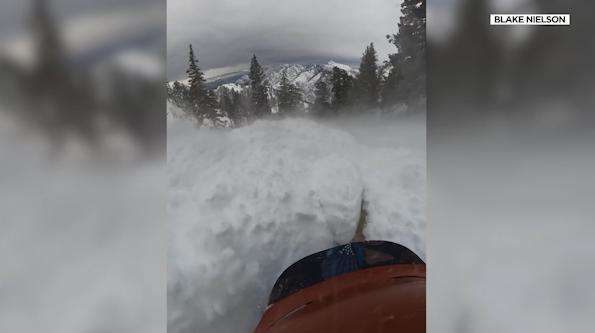 A snowboarder recounted the moments a slide swept him a few hundred feet down the side of a peak in Big Cottonwood Canyon, along with the intense video he captured of the ordeal.