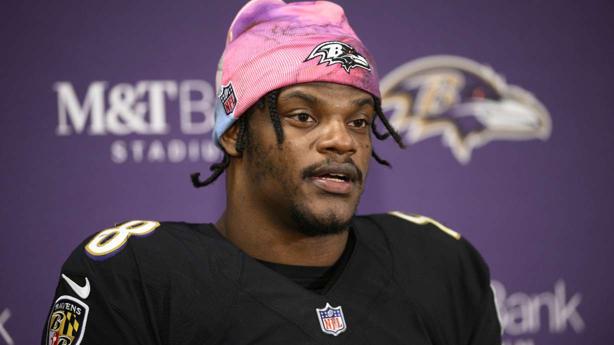 FILE - Baltimore Ravens quarterback Lamar Jackson (8) speaks to the media at a press conference after an NFL football game against the Cincinnati Bengals, Sunday, Oct. 9, 2022, in Baltimore. Lamar Jackson remained absent Wednesday, Jan. 4, 2023, from the portion of practice open to reporters. Baltimore's star quarterback hasn't practiced since injuring his knee Dec. 4 in the Ravens' victory over Denver.
