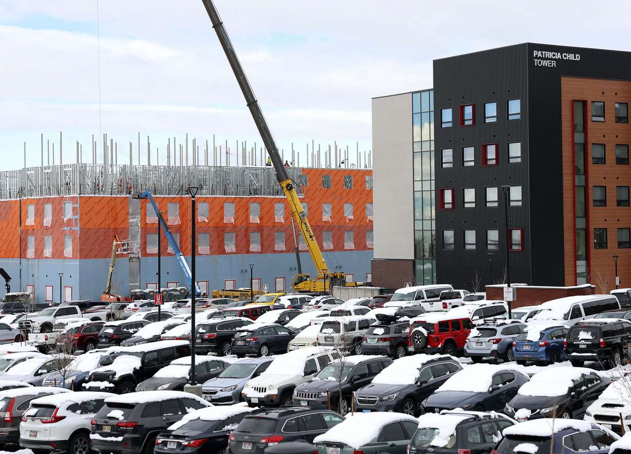 A fourth wing of Kahlert Village is under construction on the University of Utah campus in Salt Lake City on Wednesday. 430 beds in the fourth wing of Kahlert Village are slated to open in fall 2023. When trying to shift the culture of a campus from a largely commuter campus into a community, it takes more than just a few projects and on Tuesday, the University of Utah announced the latest link in the chain with a plan to double on-campus housing — adding 5,000 new student beds by 2030.