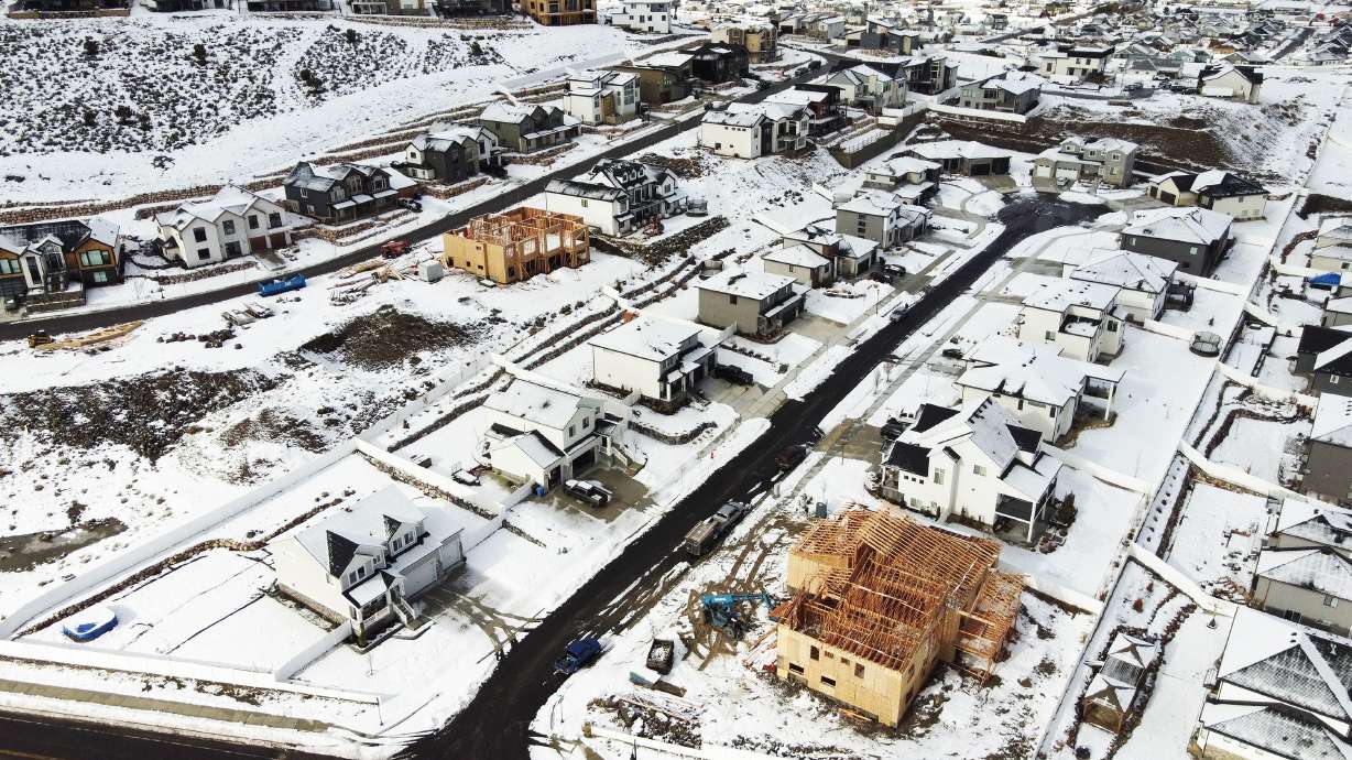 Single-family homes under construction in Herriman on Wednesday. State leaders have been exploring ideas to help chip away at Utah's estimated 31,000-unit housing shortage.