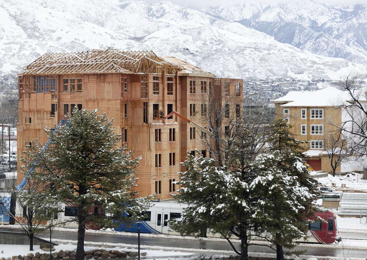 The West Village Housing Replacement Project, higher-density housing for graduate students and students with families, is under construction on the University of Utah campus in Salt Lake City on Wednesday. When trying to shift the culture of a campus from a largely commuter campus into a community, it takes more than just a few projects and on Tuesday, the University of Utah announced the latest link in the chain with a plan to double on-campus housing — adding 5,000 new student beds by 2030.