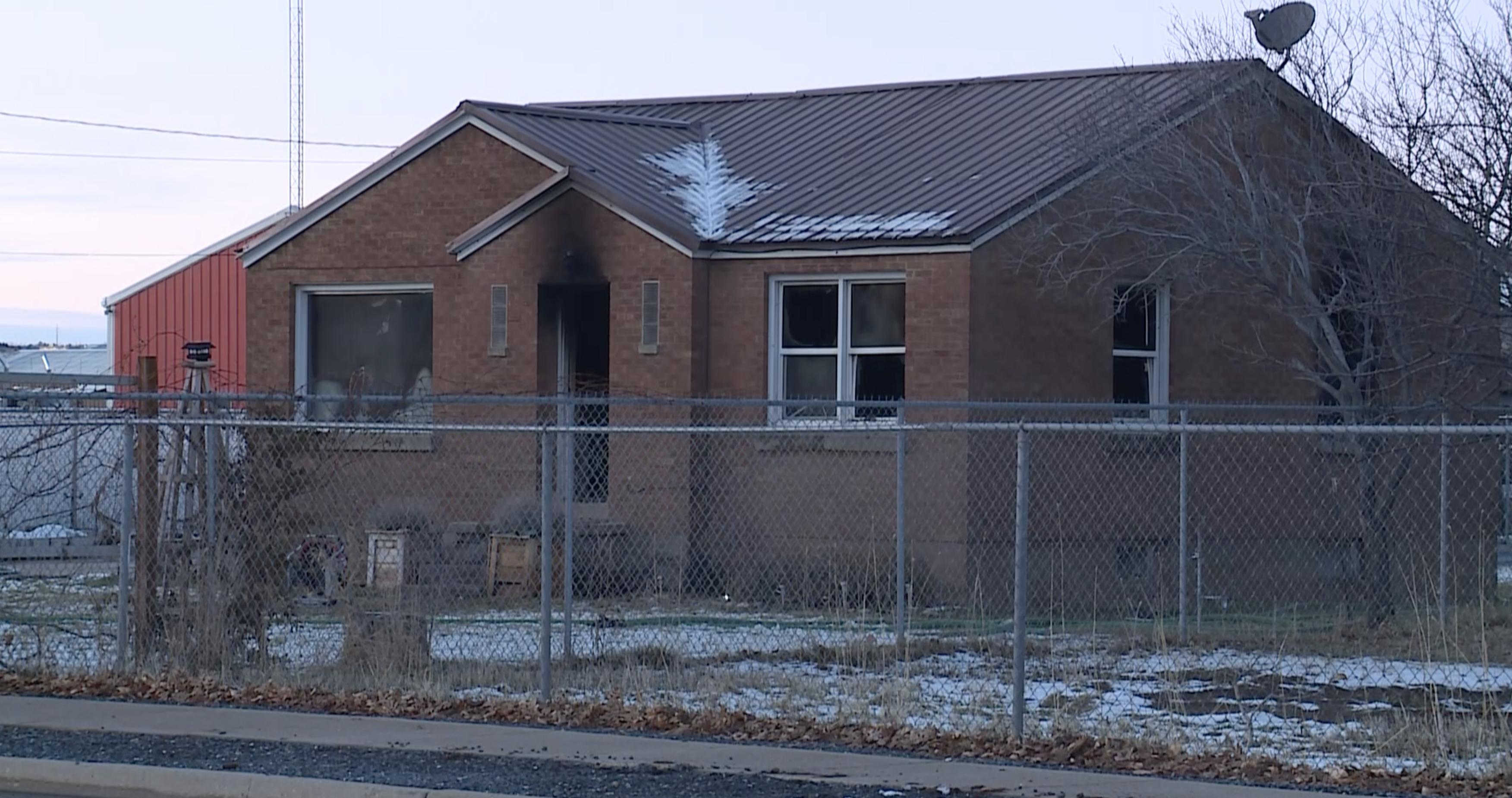 A man was taken into custody Wednesday night after police said he set a house on fire following a domestic violence incident.