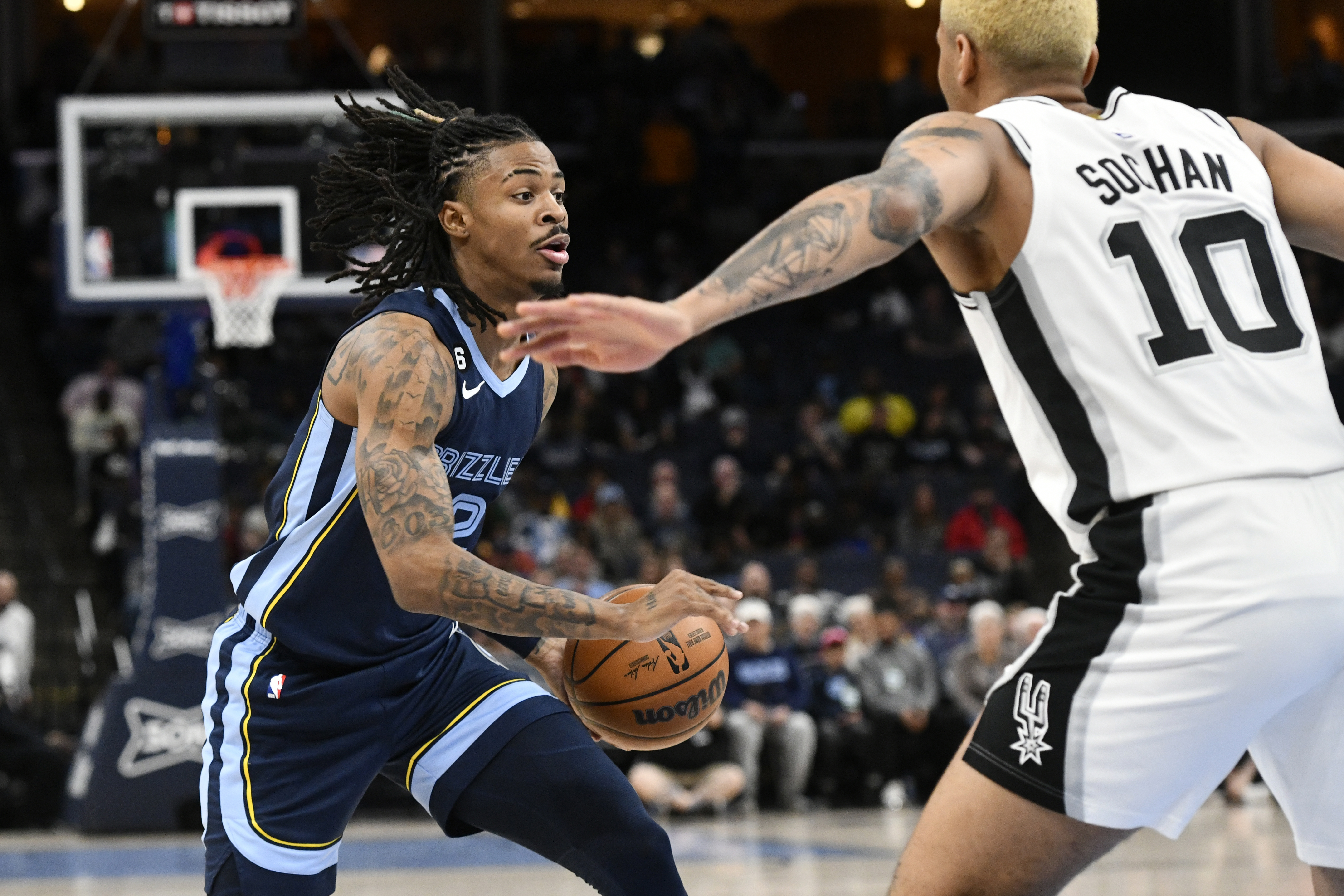 Memphis Grizzlies guard Ja Morant drives against San Antonio Spurs forward Jeremy Sochan (10) during the first half of an NBA basketball game Wednesday, Jan. 11, 2023, in Memphis, Tenn. 