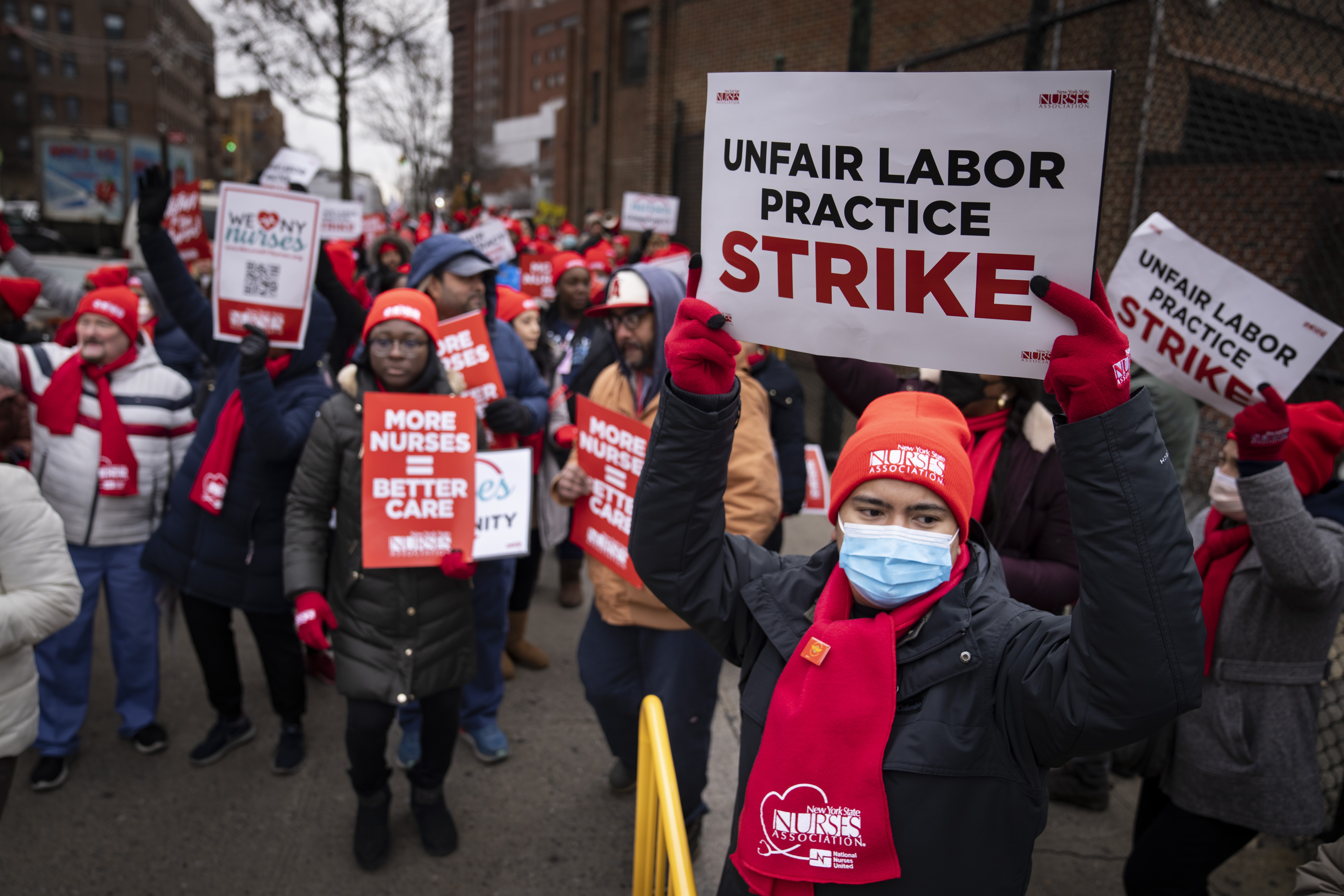 Protestors march on the streets around Montefiore Medical Center during a nursing strike, Wednesday, in the Bronx borough of New York. Thousands of nurses at Montefiore and Mount Sinai hospitals in New York City have ended a three-day strike after reaching a tentative contract agreement.