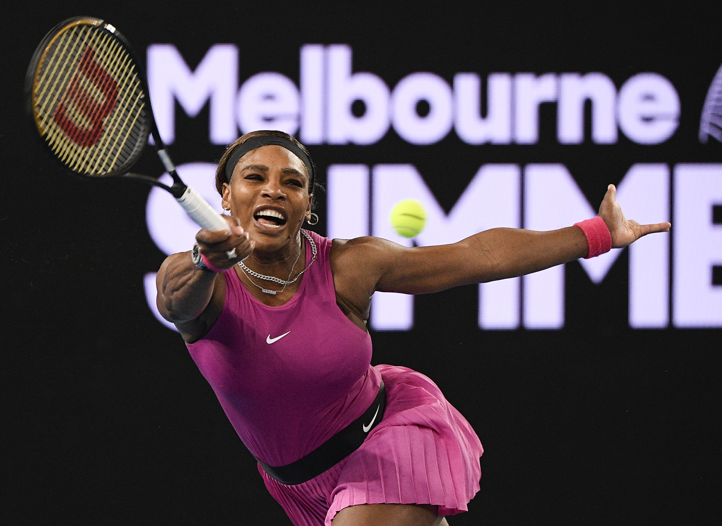 FILE - United States' Serena Williams makes a forehand return to compatriot Danielle Collins during a tuneup event ahead of the Australian Open tennis championships in Melbourne, Australia, Friday, Feb. 5, 2021. 