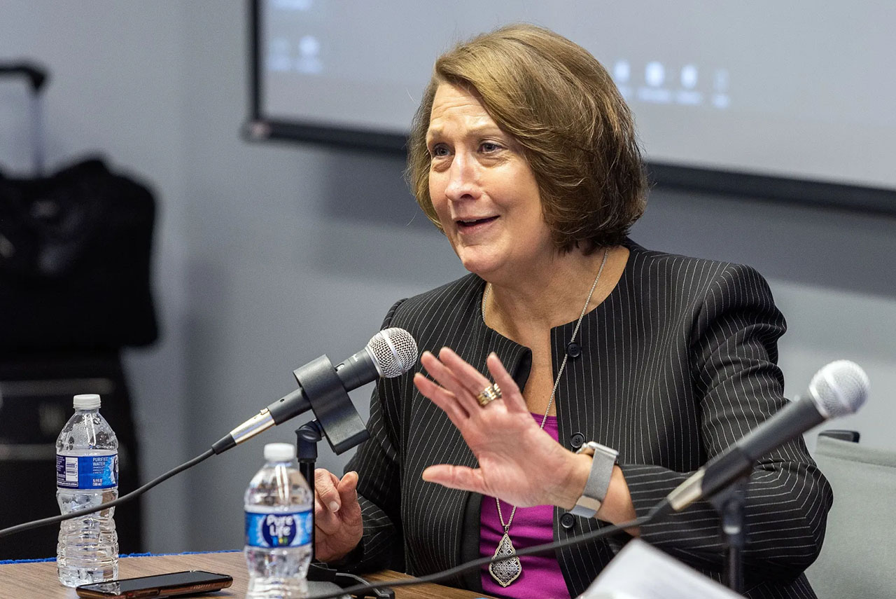 Ruth Watkins, president of Strada Impact, conducts a discussion during a forum focusing on the fate of the religious university at the offices of The American Council on Education in Washington D.C., Thursday.