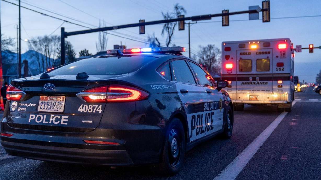 Emergency responders respond after two children were hit by a car near Hawthorne Elementary School in Salt Lake City on Friday.