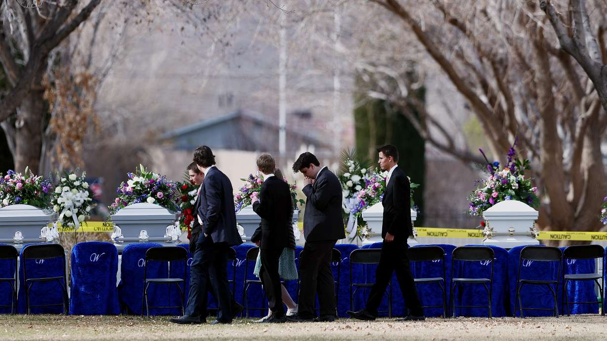 A group of young people leave the La Verkin City Cemetery following graveside services in La Verkin, Washington County, for members of the Haight and Earl families on Friday.