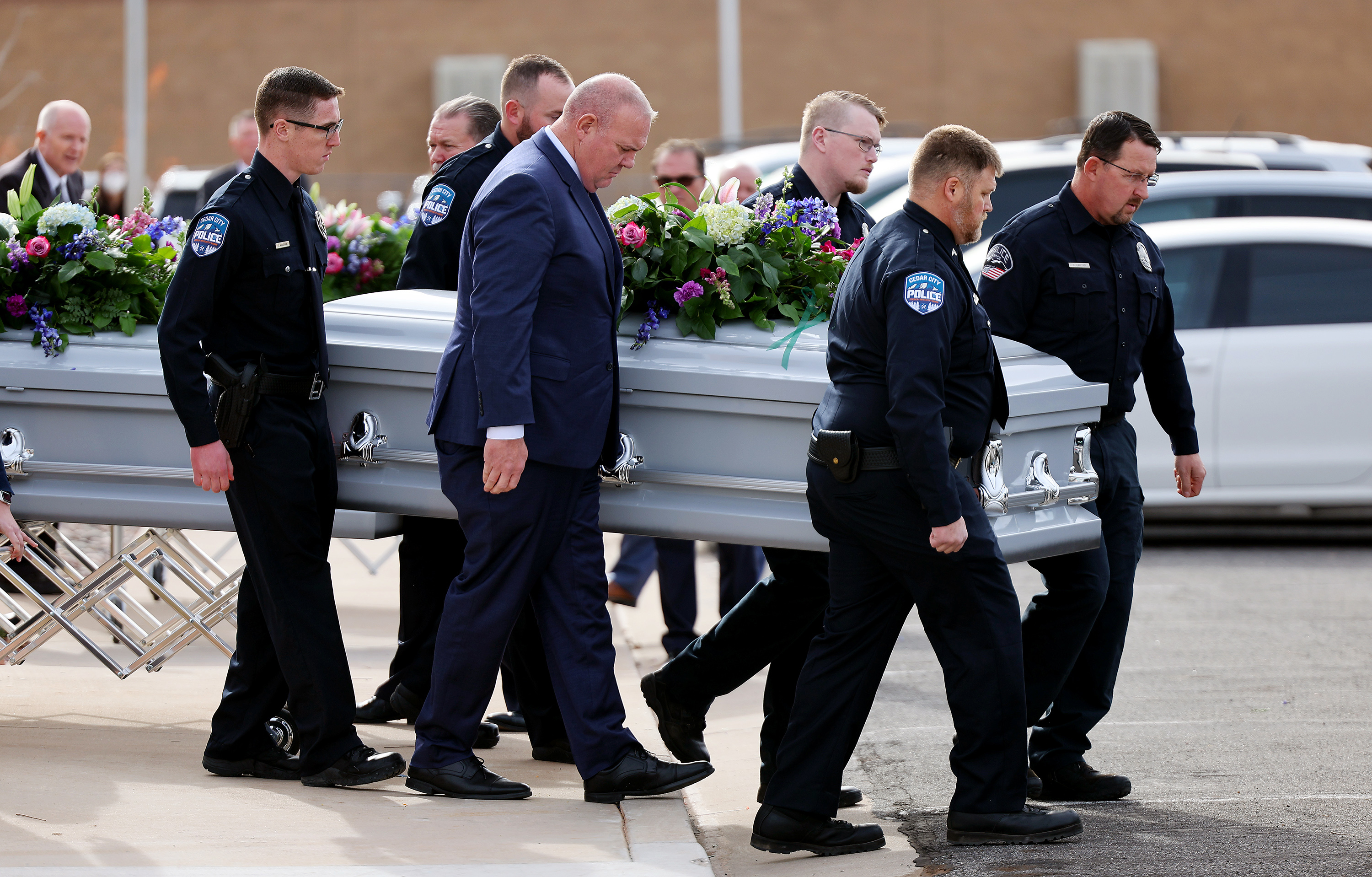 The caskets are brought out following funeral services in La Verkin, Washington County, for members of the Haight and Earl families. Tausha Haight, her 17-year-old daughter Macie, 12-year-old daughter Briley, 7-year-old twins Sienna and Ammon, 4-year-old son Gavin and Height's mother Gail Earl were laid to rest in the La Verkin City Cemetery on Friday.