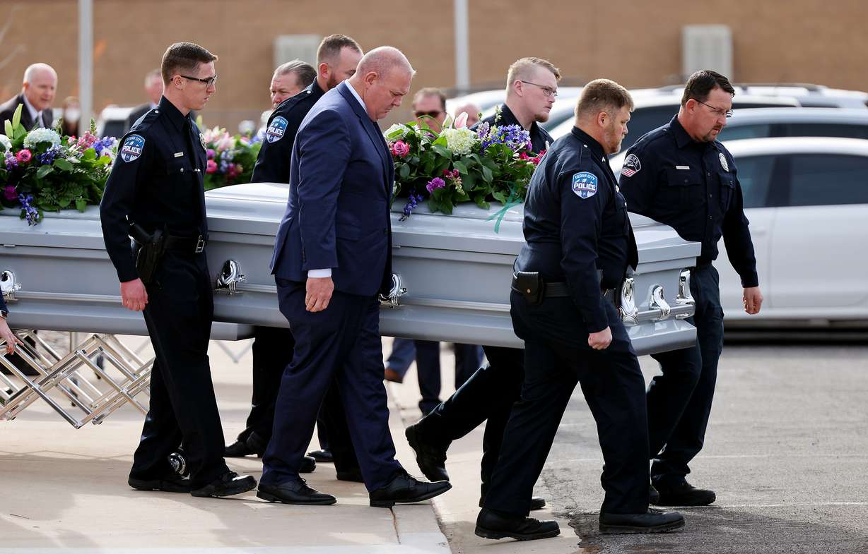 The caskets are brought out following funeral services in La Verkin, Washington County, for members of the Haight and Earl families. Tausha Haight, her 17-year-old daughter Macie, 12-year-old daughter Briley, 7-year-old twins Sienna and Ammon, 4-year-old son Gavin and Height's mother Gail Earl were laid to rest in the La Verkin City Cemetery on Friday.