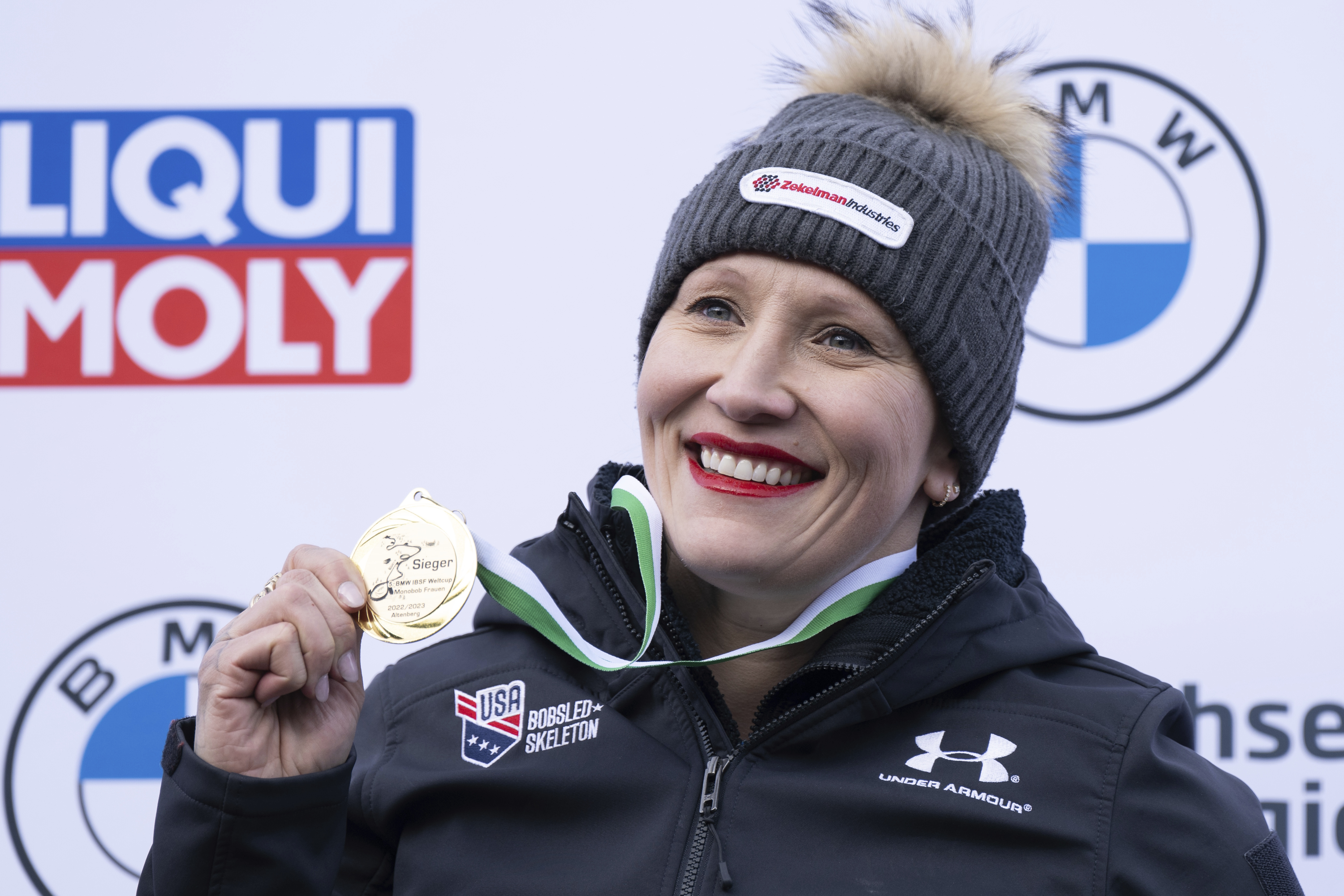 First placed Kaillie Humphries from the USA stands on the podium during the award ceremony for the women's monobob Bobsleigh World Cup race in Altenberg, Germany, Saturday, Jan. 14, 2023. 