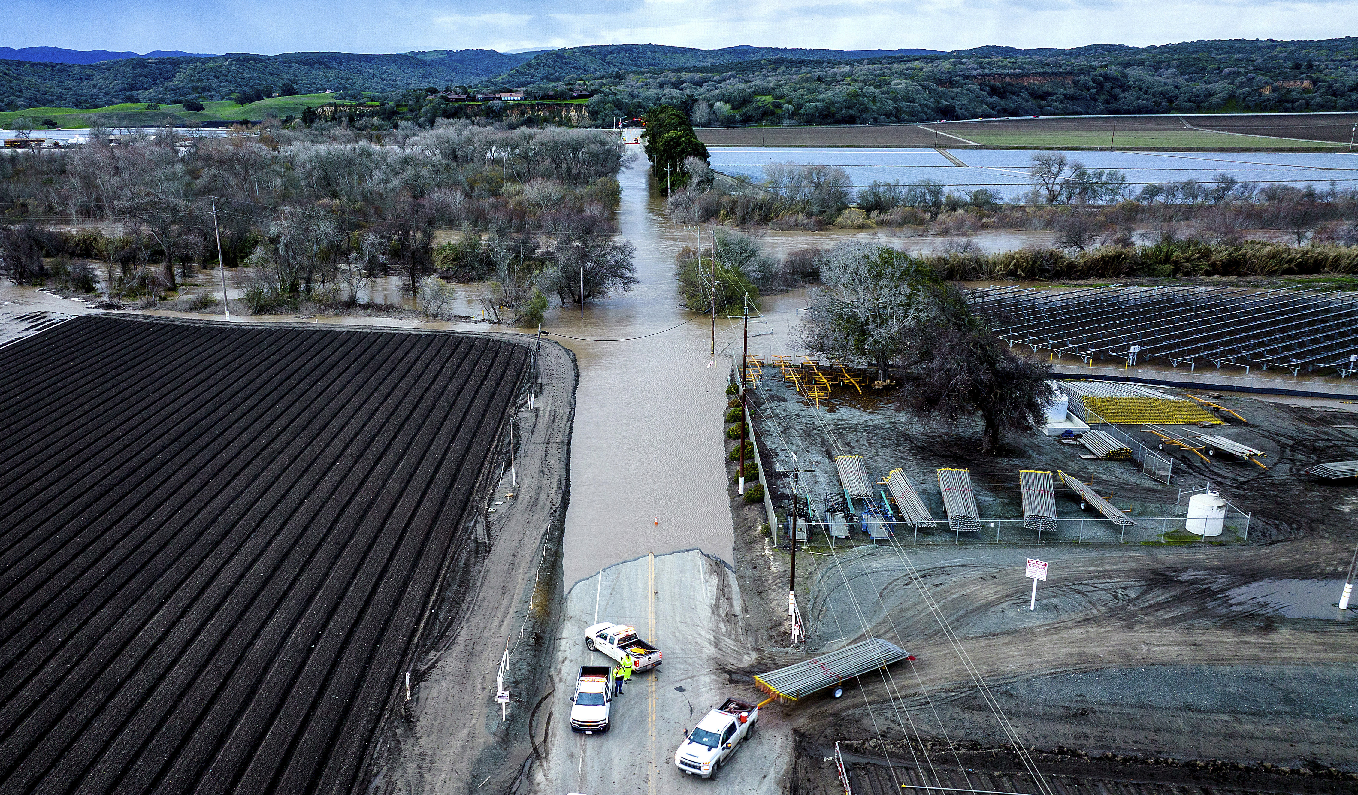 Floodwaters cover South Davis Rd. near Salinas in Monterey County, Calif., as the Salinas River overflows its banks on Friday.