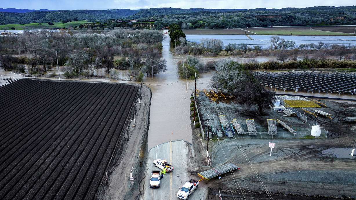 Floodwaters cover South Davis Rd. near Salinas in Monterey County, Calif., as the Salinas River overflows its banks on Friday.
