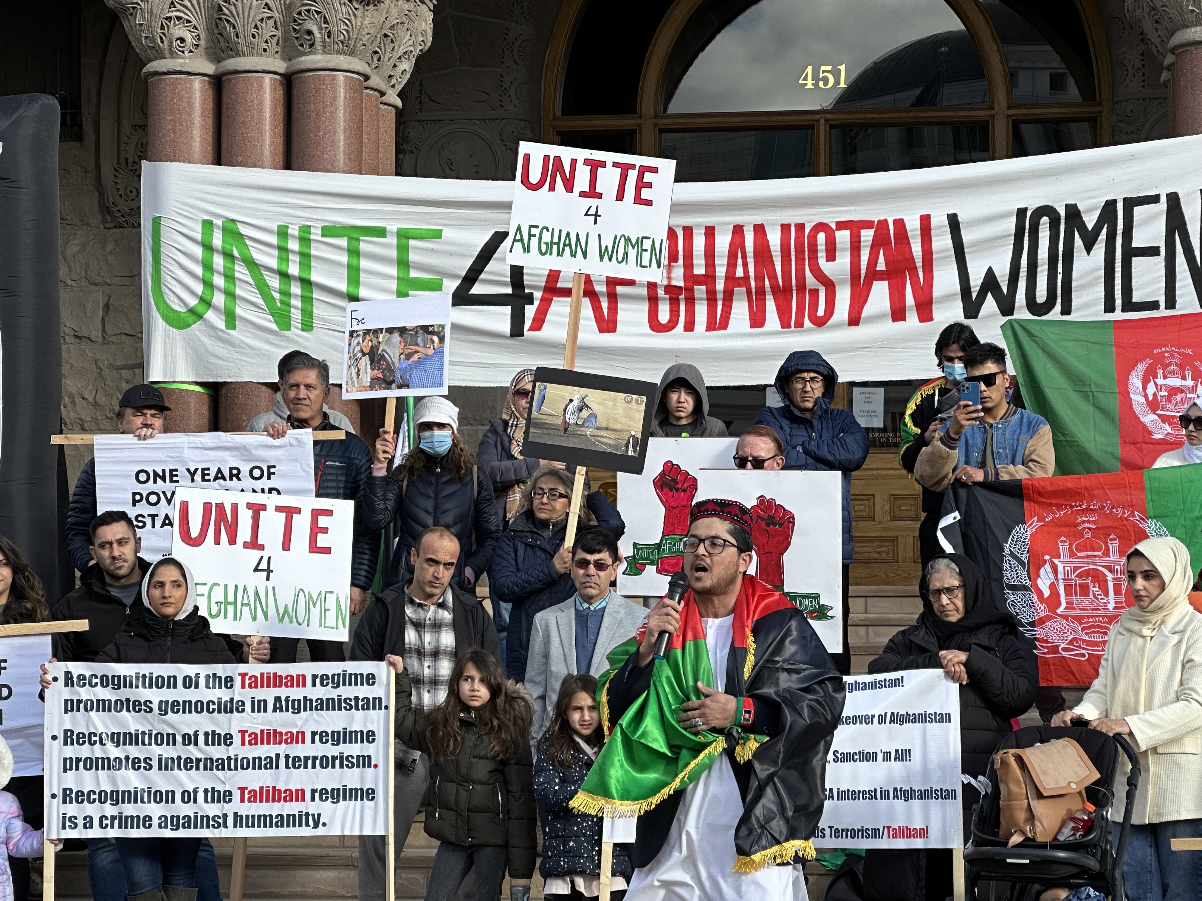An Afghan refugee speaks about the Taliban's actions against women in Afghanistan during a demonstration at Washington Square Park in Salt Lake City on Jan. 14. 