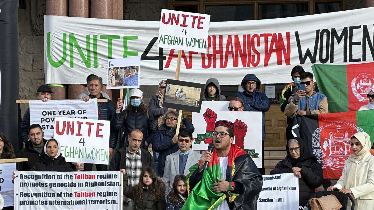An Afghan refugee speaks about the Taliban's actions against women in Afghanistan during a demonstration at Washington Square Park in Salt Lake City on Jan. 14.