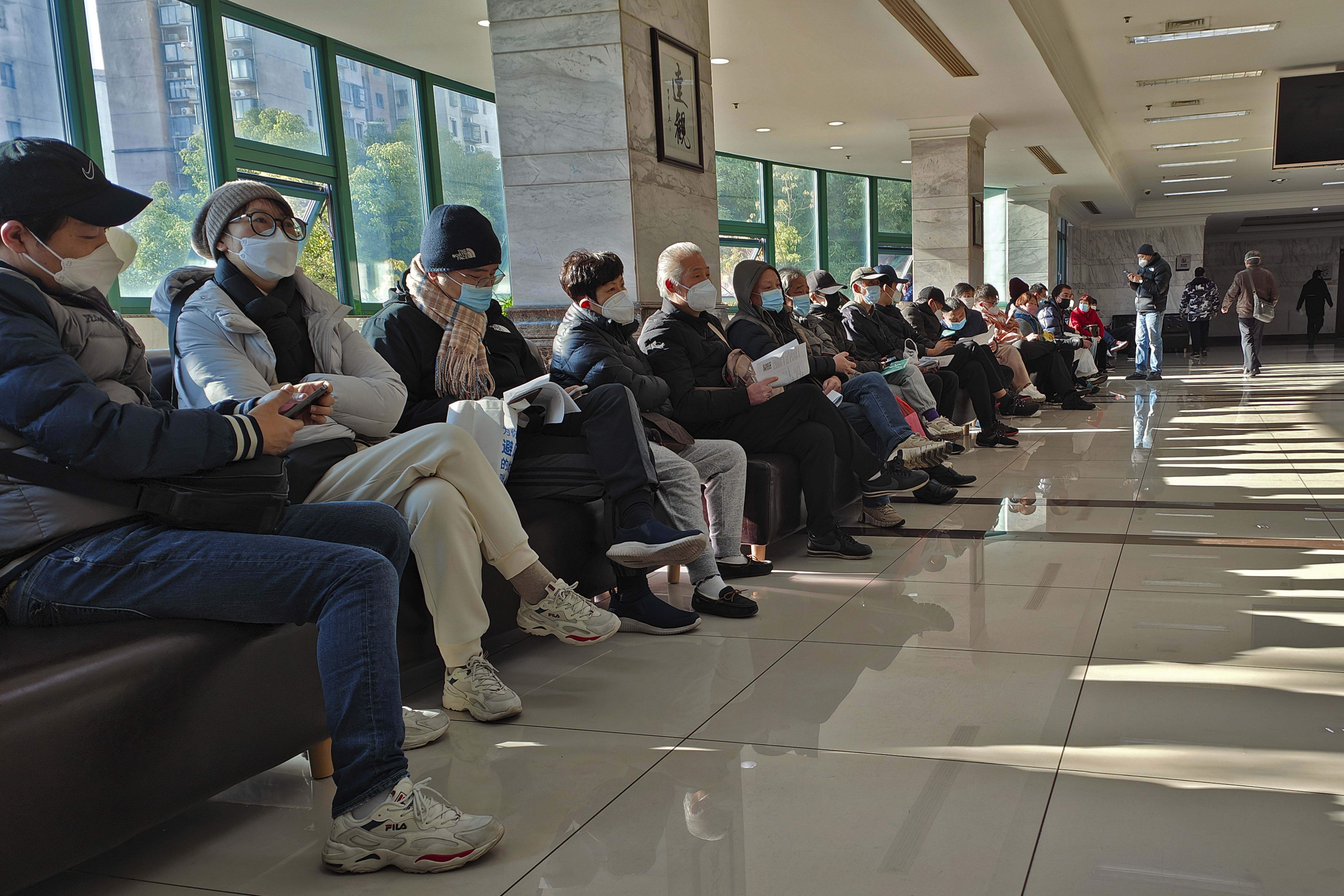 Family members of the deceased wait for the cremation procedures at a funeral home in Shanghai, China on Jan. 4, 2023.