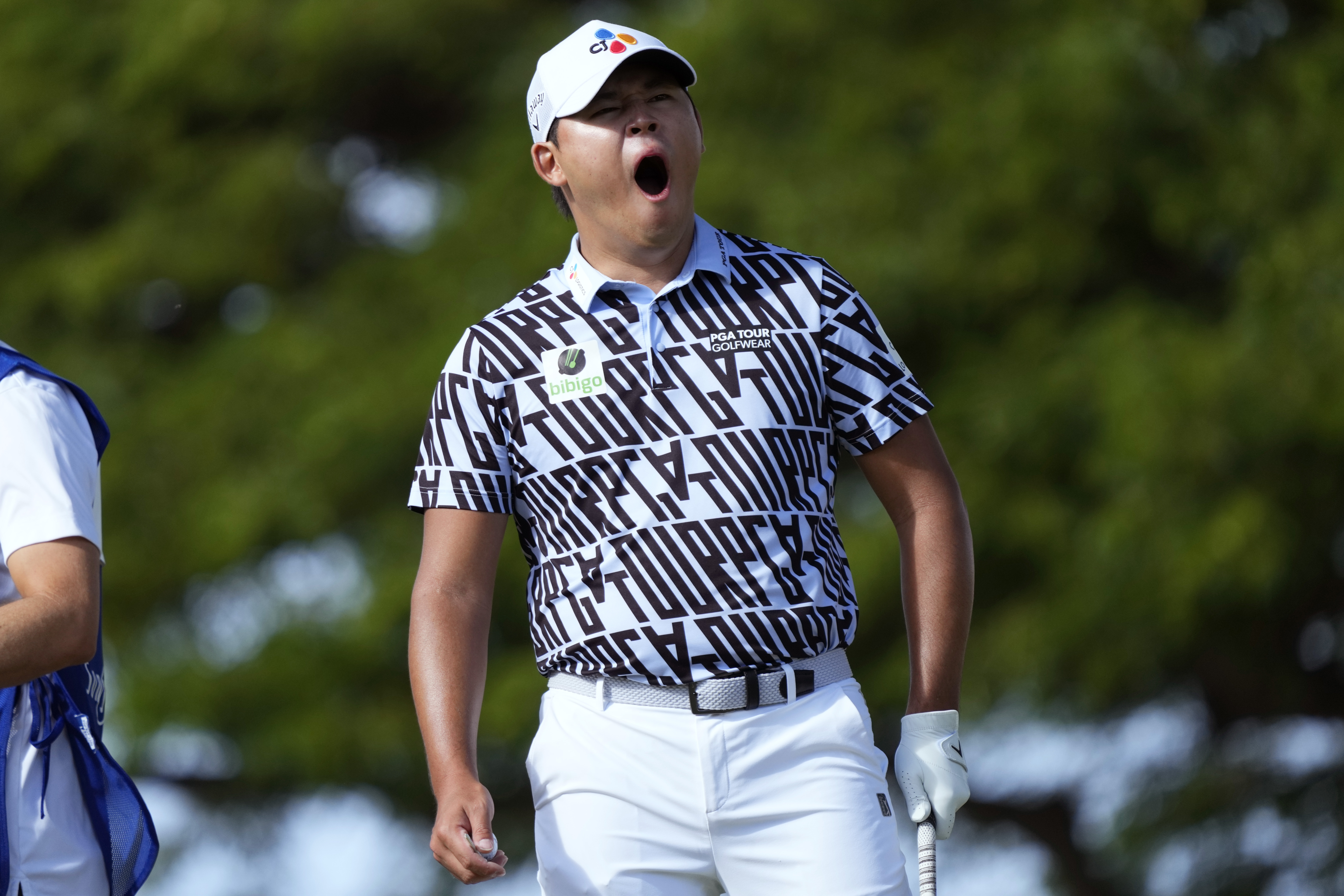 Si Woo Kim yawns on the second tee during the final round of the Sony Open golf tournament, Sunday, Jan. 15, 2023, at Waialae Country Club in Honolulu. 