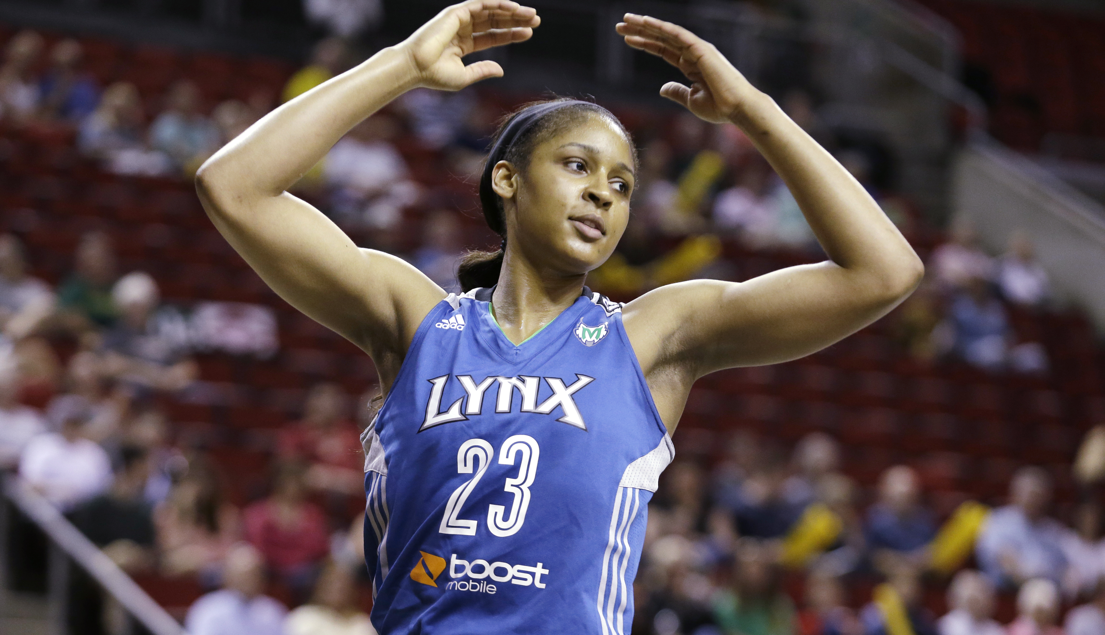 Minnesota Lynx's Maya Moore in action against the Seattle Storm in the first half of a WNBA basketball game, Sept. 10, 2013, in Seattle. Moore has officially decided to retire from playing basketball, making her announcement on “Good Morning America” on Monday, Jan. 16, 2023. 