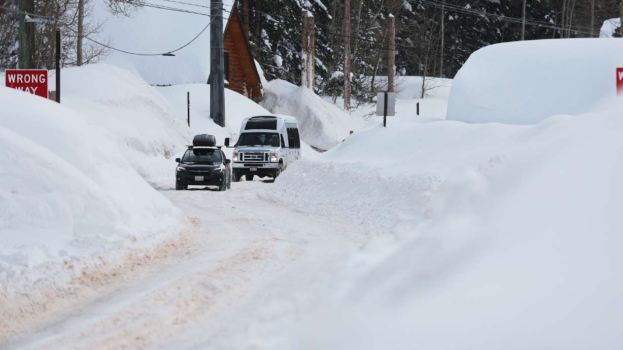 Motorists drive near Brighton Ski Resort on Wednesday. The resort received another 2 feet of snow over the weekend and may receive another foot or more in the next few days as a result of the next storm to impact Utah.