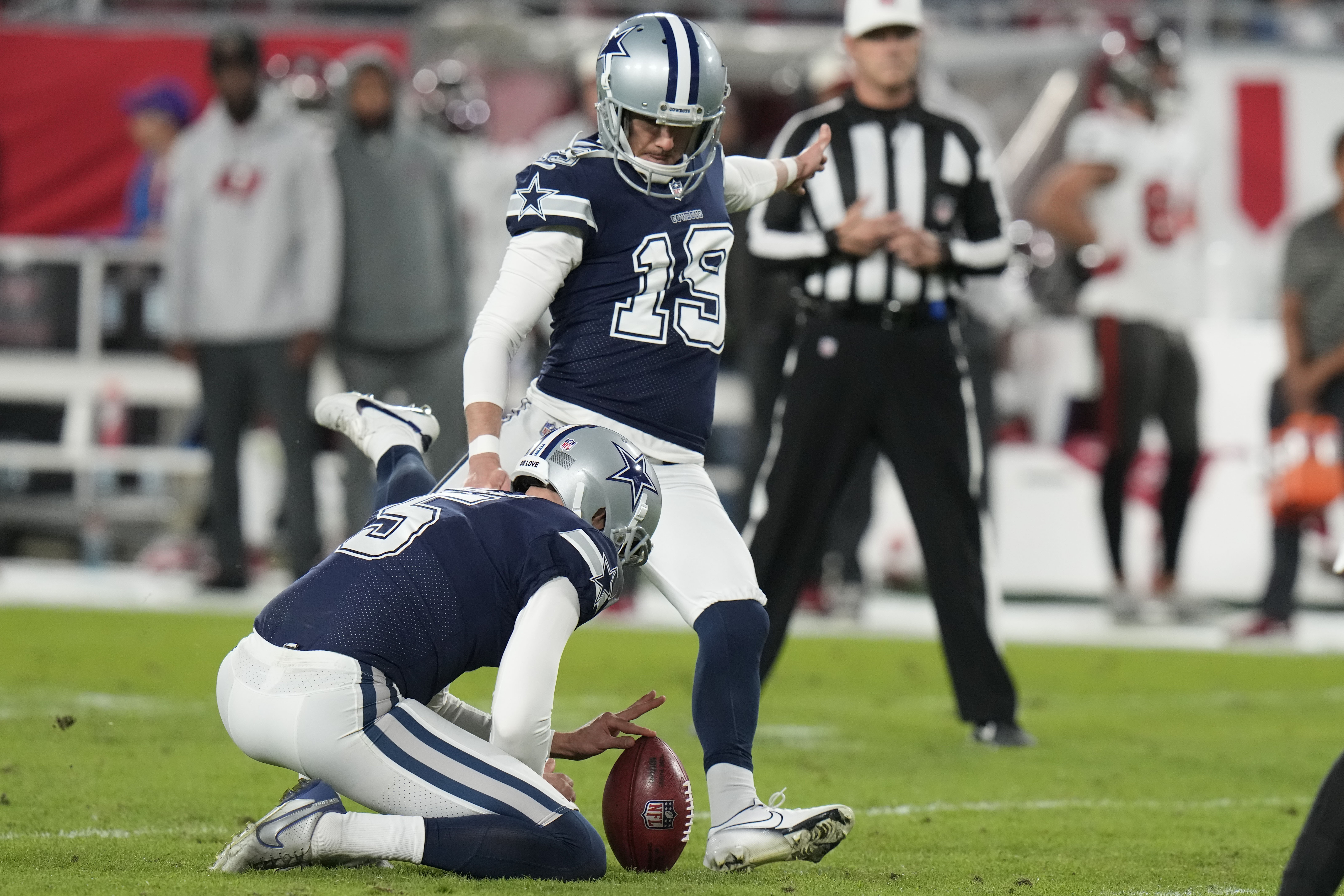 Dallas Cowboys place kicker Brett Maher (19) misses an extra point against the Tampa Bay Buccaneers during the second half of an NFL wild-card football game, Monday, Jan. 16, 2023, in Tampa, Fla. Maher missed his fourth attempt at an extra point. 