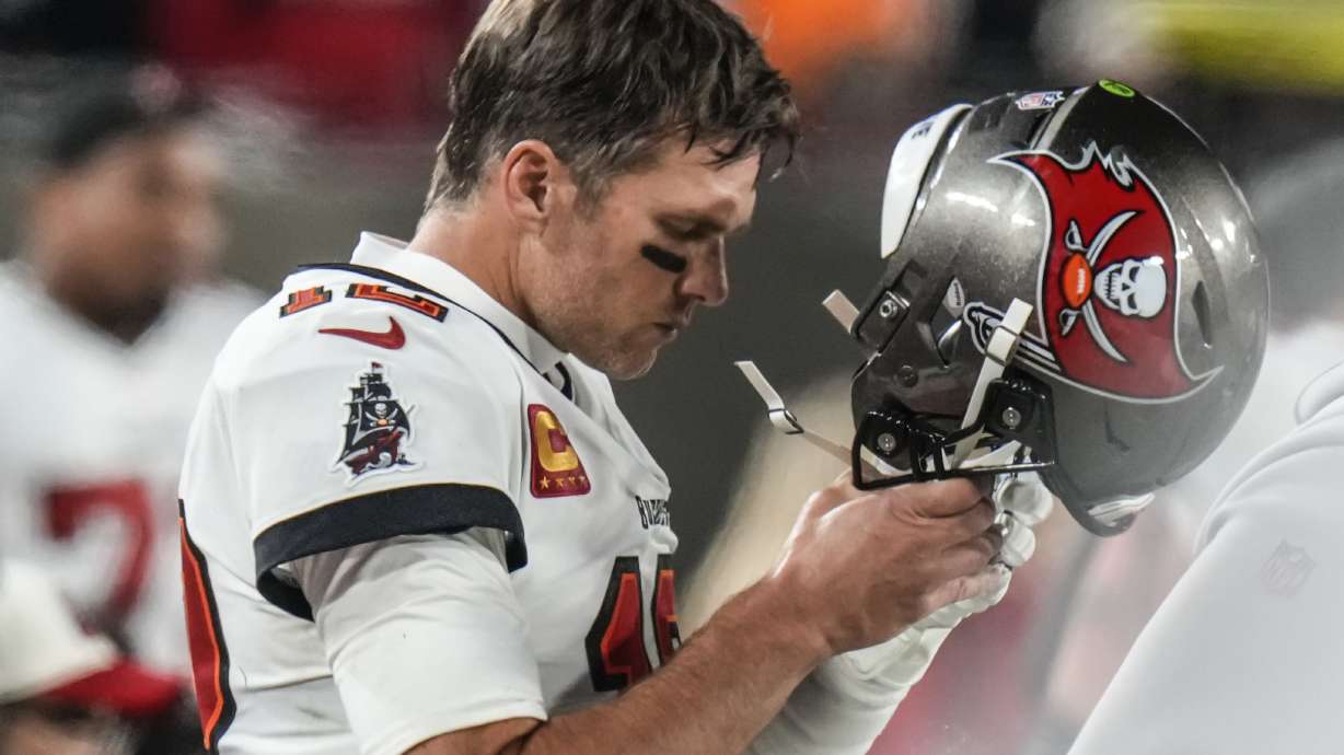 Tampa Bay Buccaneers quarterback Tom Brady walks on the sidelines during the second half of an NFL wild-card football game against the Dallas Cowboys, Jan. 16, in Tampa, Fla.
