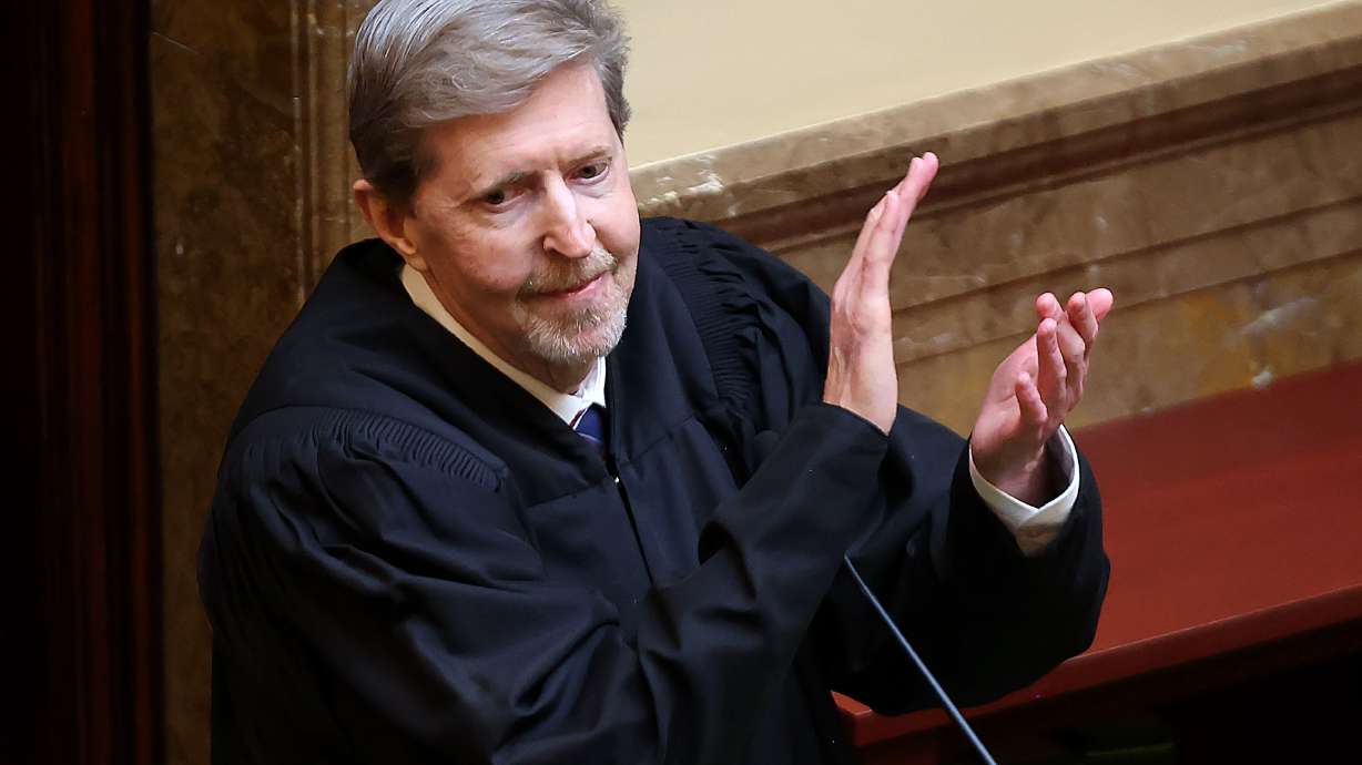 Utah Chief Justice Matthew B. Durrant applauds his fellow justices as he gives the state of the judiciary speech in the House of Representatives during the opening day of the 2023 legislative session at the Capitol in Salt Lake City on Tuesday.
